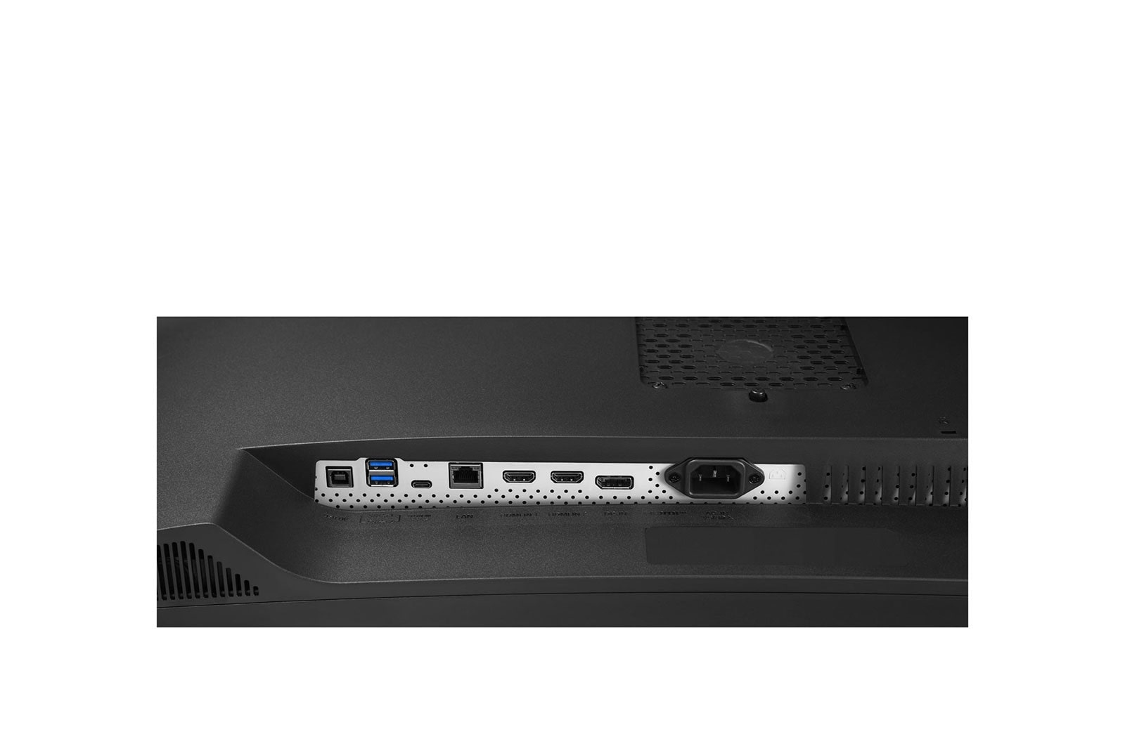 Tylny panel czarnego monitora z różnymi portami, w tym USB, HDMI i złączem zasilania.
