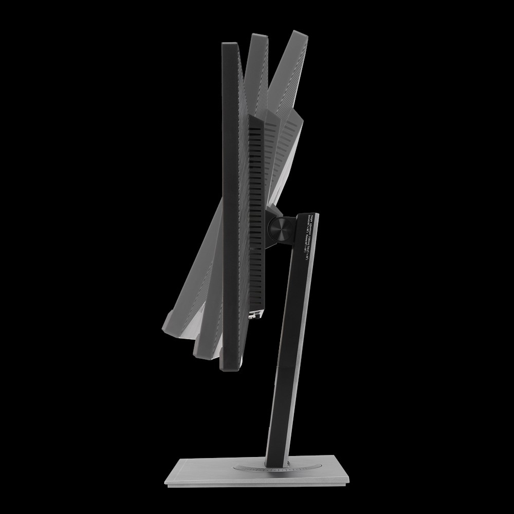 Widok z boku monitora komputerowego, czarna ramka, regulowany, na stojaku. Ekran jest pochylony, czarne tło.