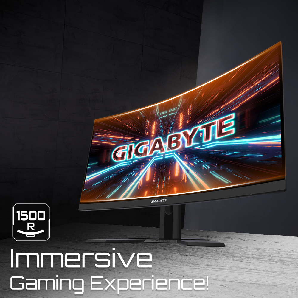 Monitor Gigabyte curvo con pantalla de neón. El texto dice 'Immersive Gaming Experience!' y '1500 R'. El fondo es oscuro.