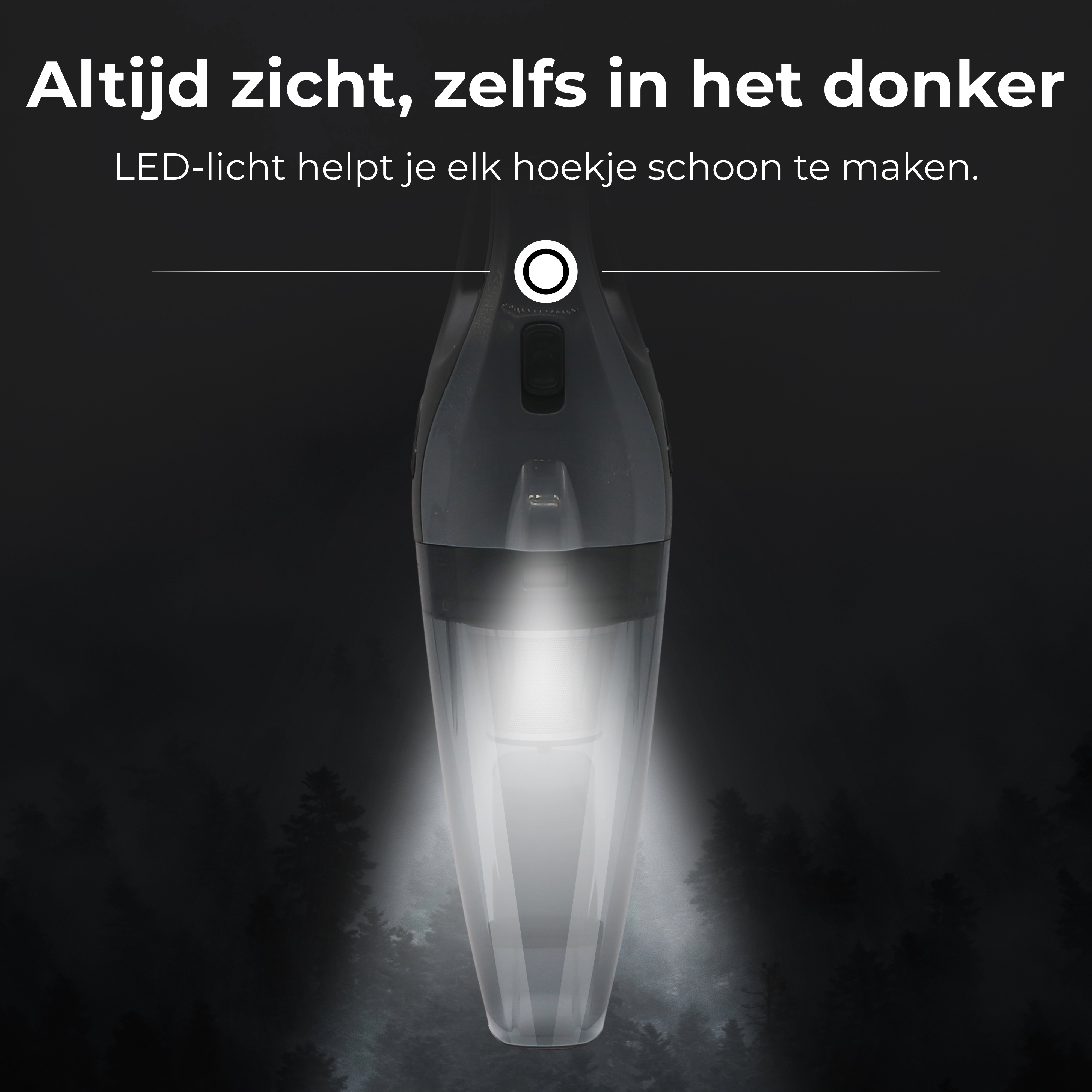 A hand vacuum illuminates the dark. LED light shines downwards. A forest silhouette forms the background.