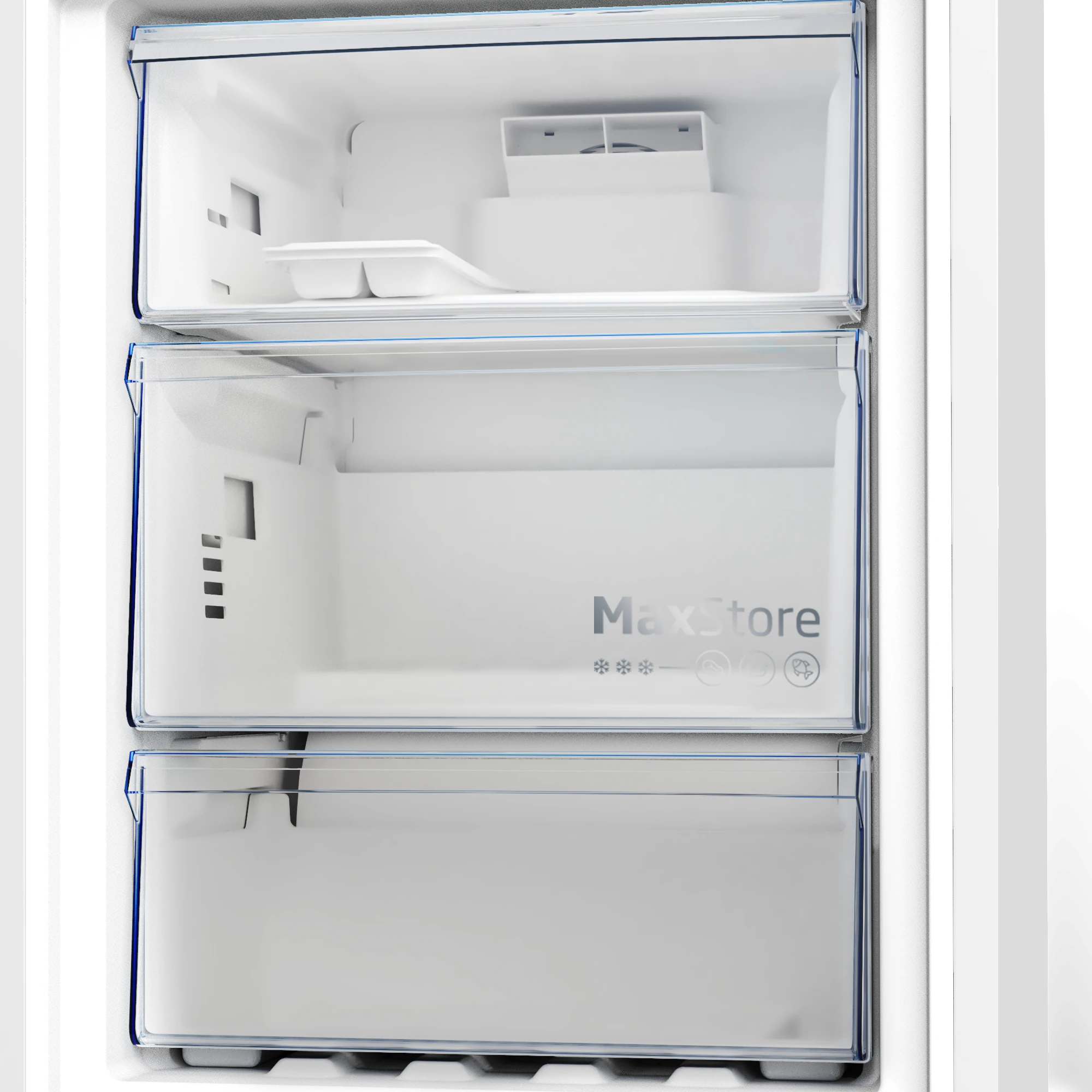Primer plano del interior de un frigorífico. Tiene tres cajones transparentes. El cajón del medio tiene el texto MaxStore.