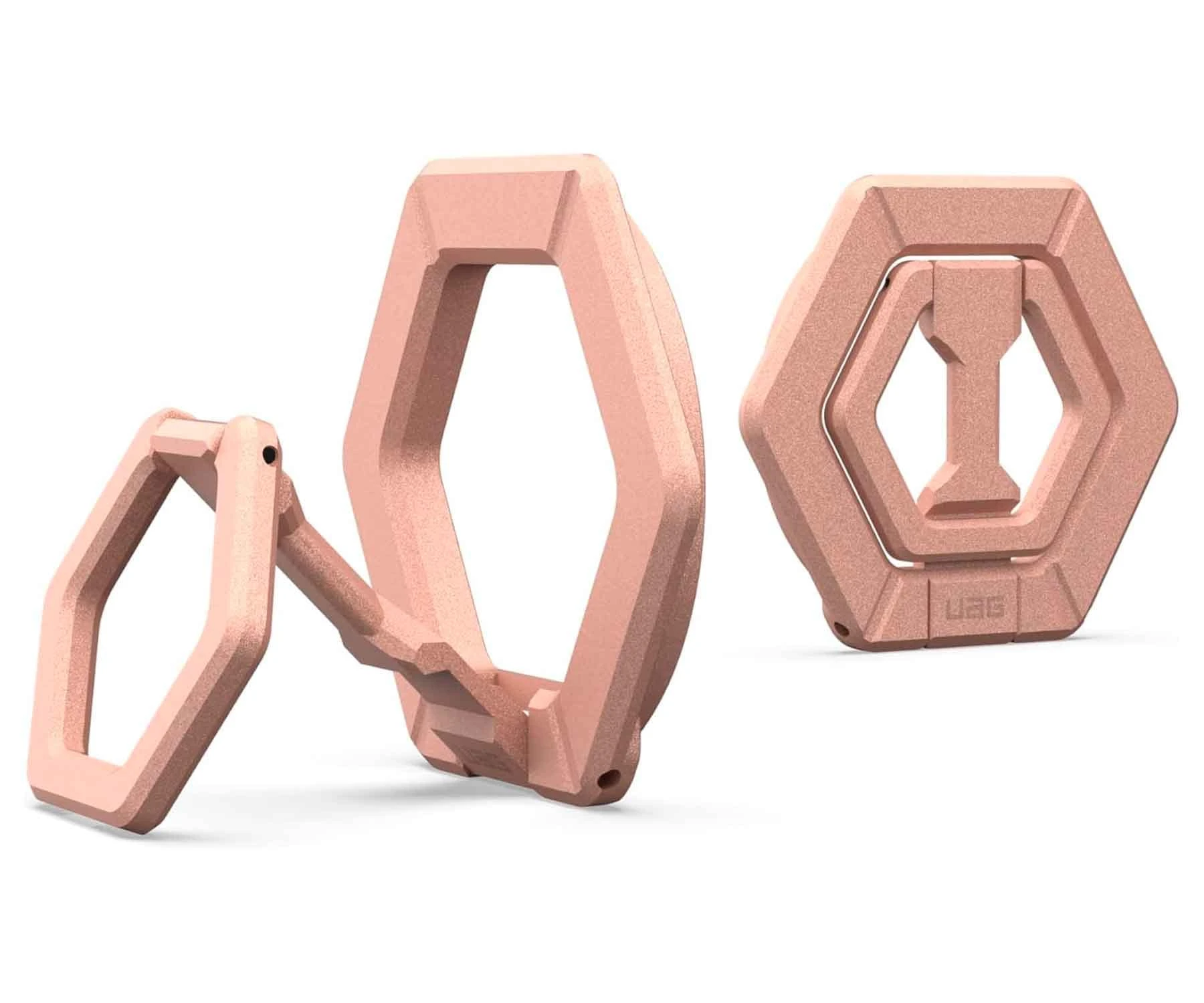 Drei roségoldene Telefonzubehörteile. Eines ist offen, zwei sind geschlossen, sechseckige Formen. UAG-Logo auf einem. Alles auf weißem Hintergrund.