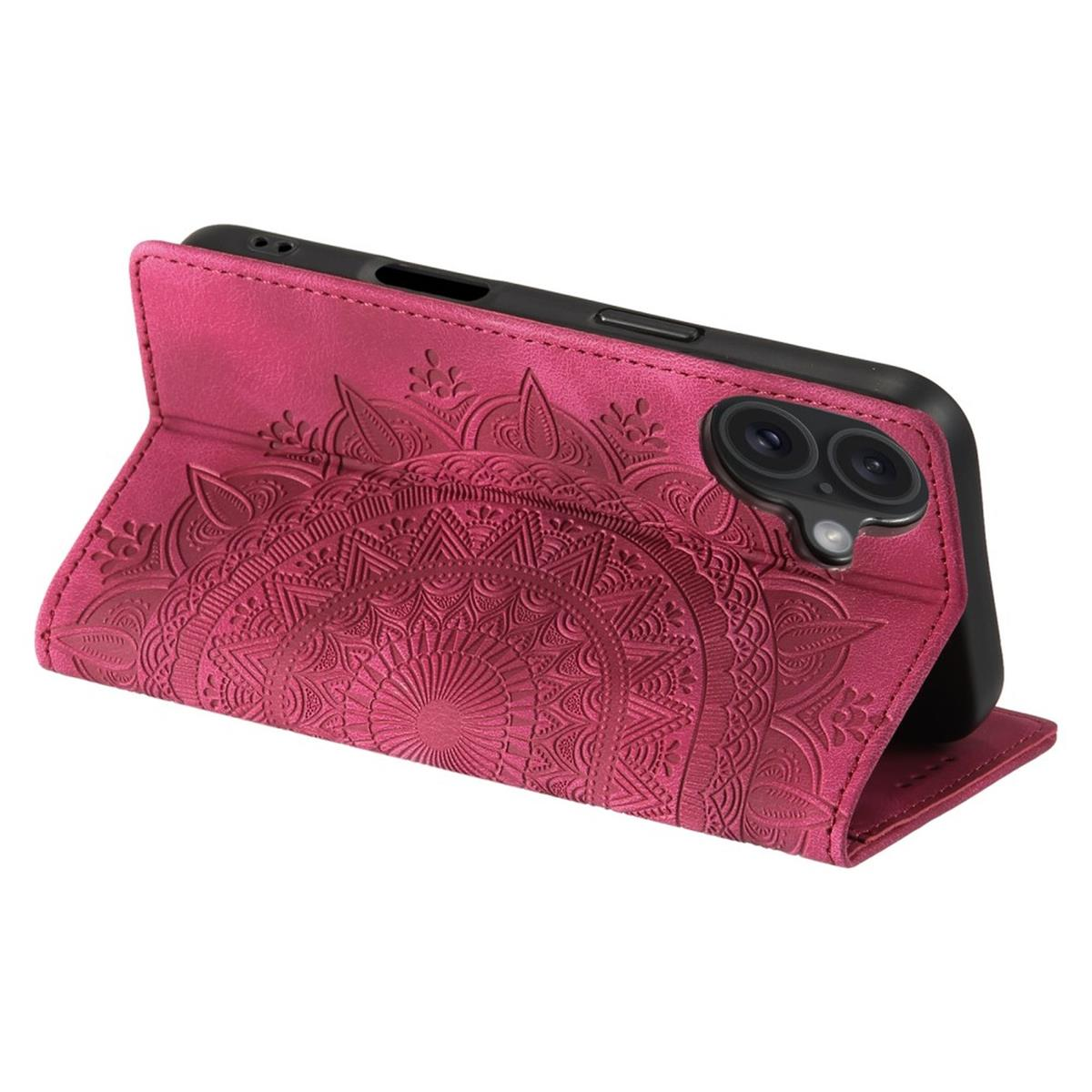 Eine magentafarbene Handyhülle mit Mandala-Design, die ein schwarzes Telefon hält. Die Hülle ist offen und steht. Weißer Hintergrund.