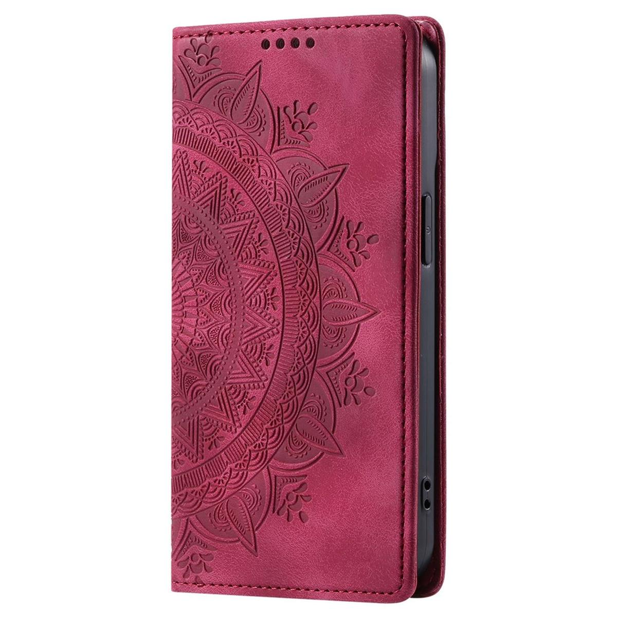 Ein magentafarbenes Handycase mit Mandalamuster wird gezeigt. Das Case ist geschlossen. Das Design ist geprägt.
