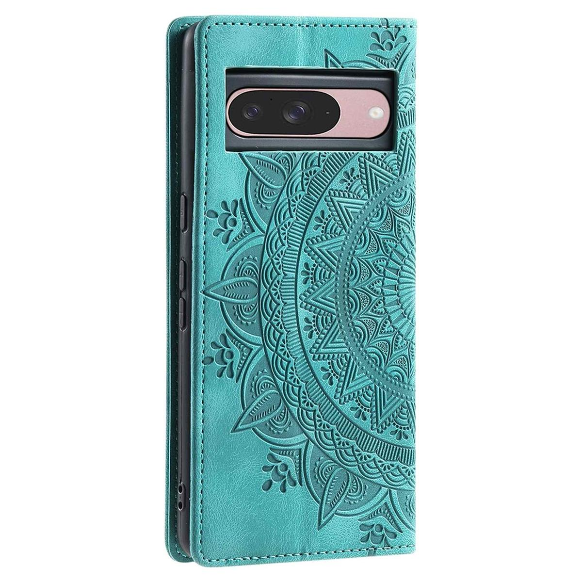 Türkisfarbene Handyhülle mit Mandala-Design. Telefon mit Kamera sichtbar. Lederartige Hülle mit Steppnähten.