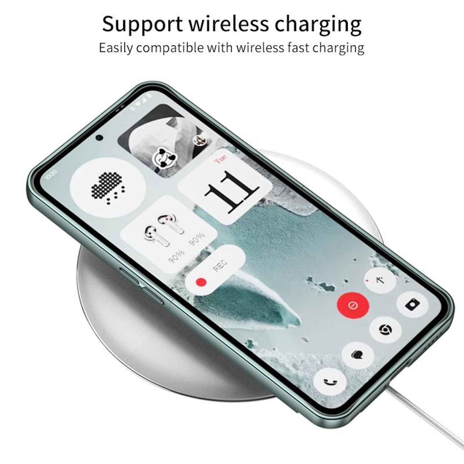 Ein Smartphone auf einem kabellosen Ladegerät. Das Telefon zeigt einen Startbildschirm mit App-Symbolen an. Das Ladegerät ist silberfarben und das Telefon ist grün.