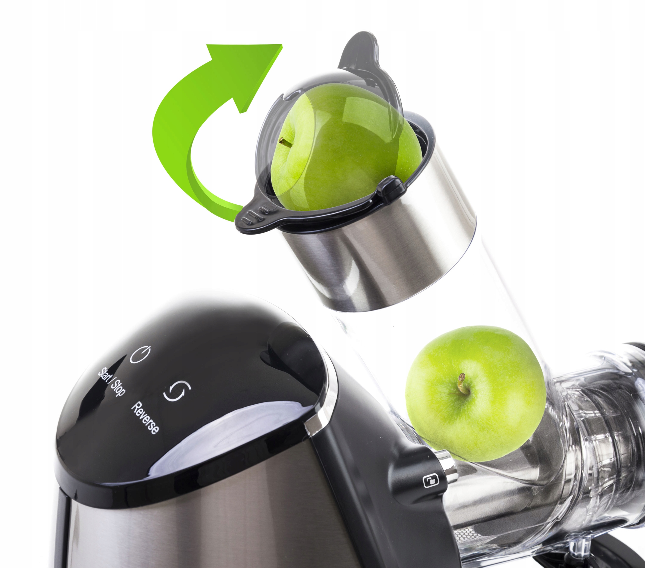 Wyciągarka soku z zielonym jabłkiem wkładanym. Drugie jabłko jest w środku.