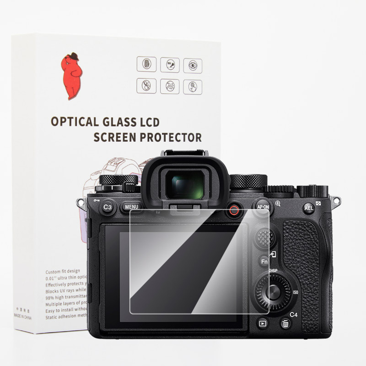 Aparat z osłoną ekranu przed pudełkiem. Na pudełku napis 'OPTICAL GLASS LCD SCREEN PROTECTOR'.