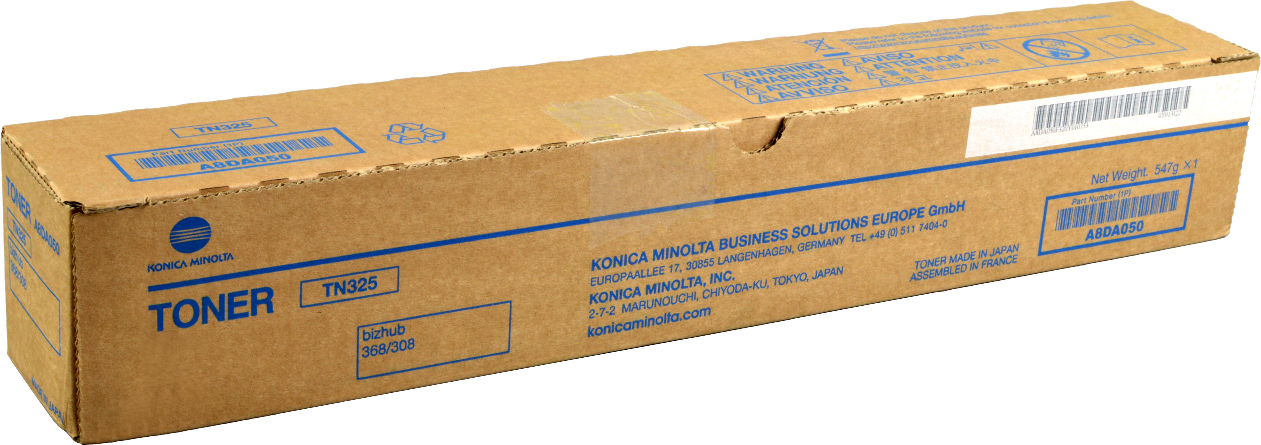 Una scatola di cartone di toner Konica Minolta, modello TN325. La scatola ha testo blu e un codice a barre.