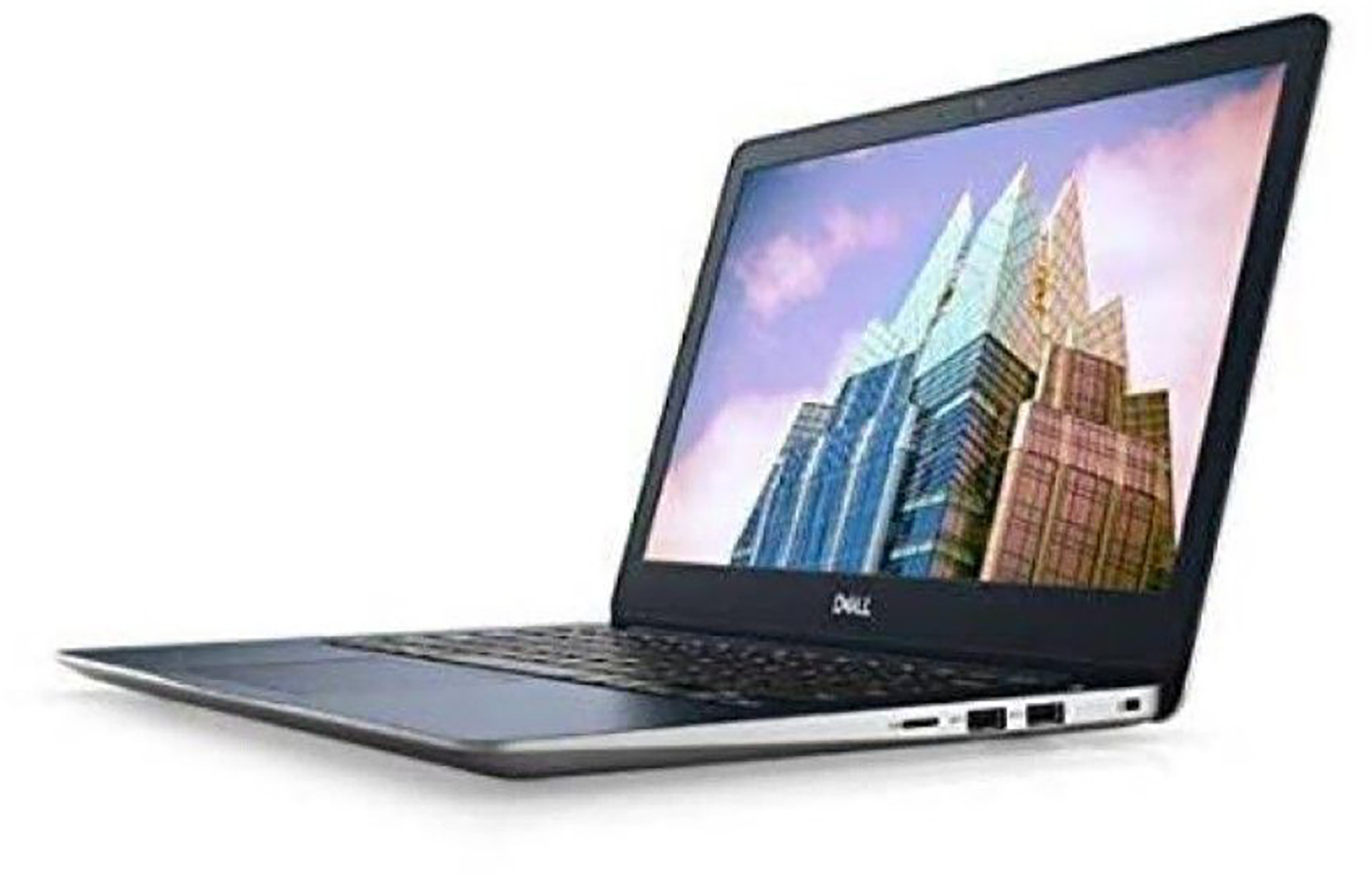 Een Dell laptop is open. Het scherm toont een stadsgezicht. De laptop staat op een wit oppervlak.