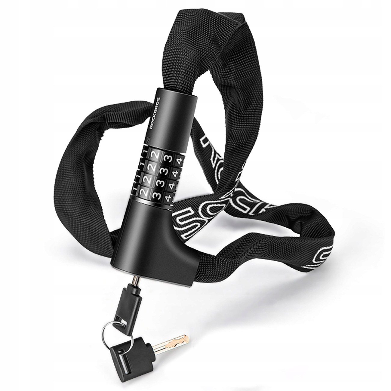 Czarna blokada rowerowa z pokrętłami kombinacyjnymi. Zawiera klucze. Zamek jest połączony z czarnym łańcuchem. Białe tło.