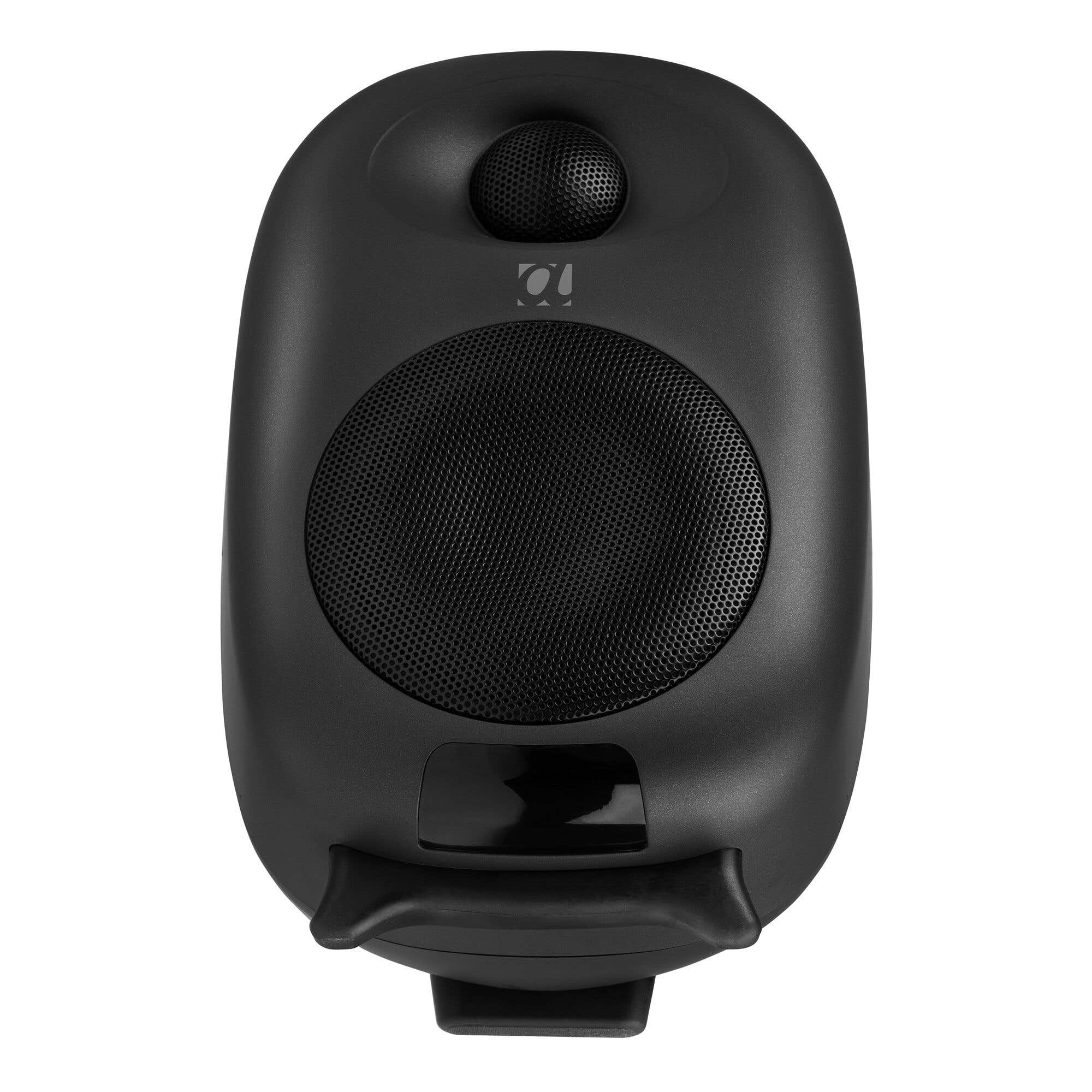 Altavoz negro con un altavoz de malla redondo y un altavoz de malla más pequeño en la parte superior. Un logotipo es visible.