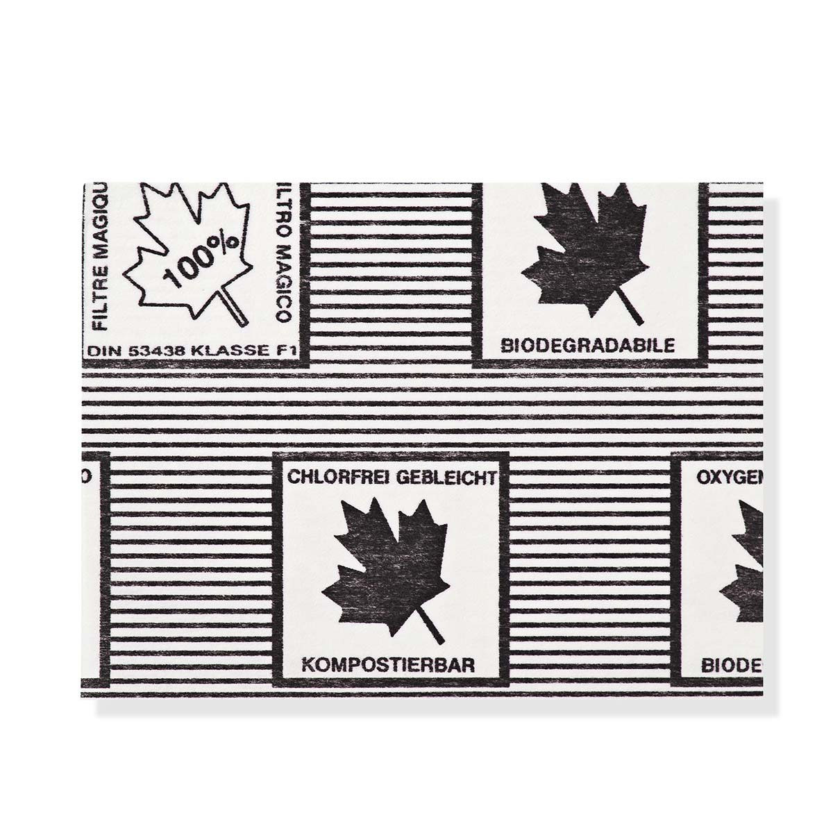 A white and black pattern featuring text, a leaf, and phrases like 'Biodegradable' and 'Kompostierbar'. The background has horizontal lines.