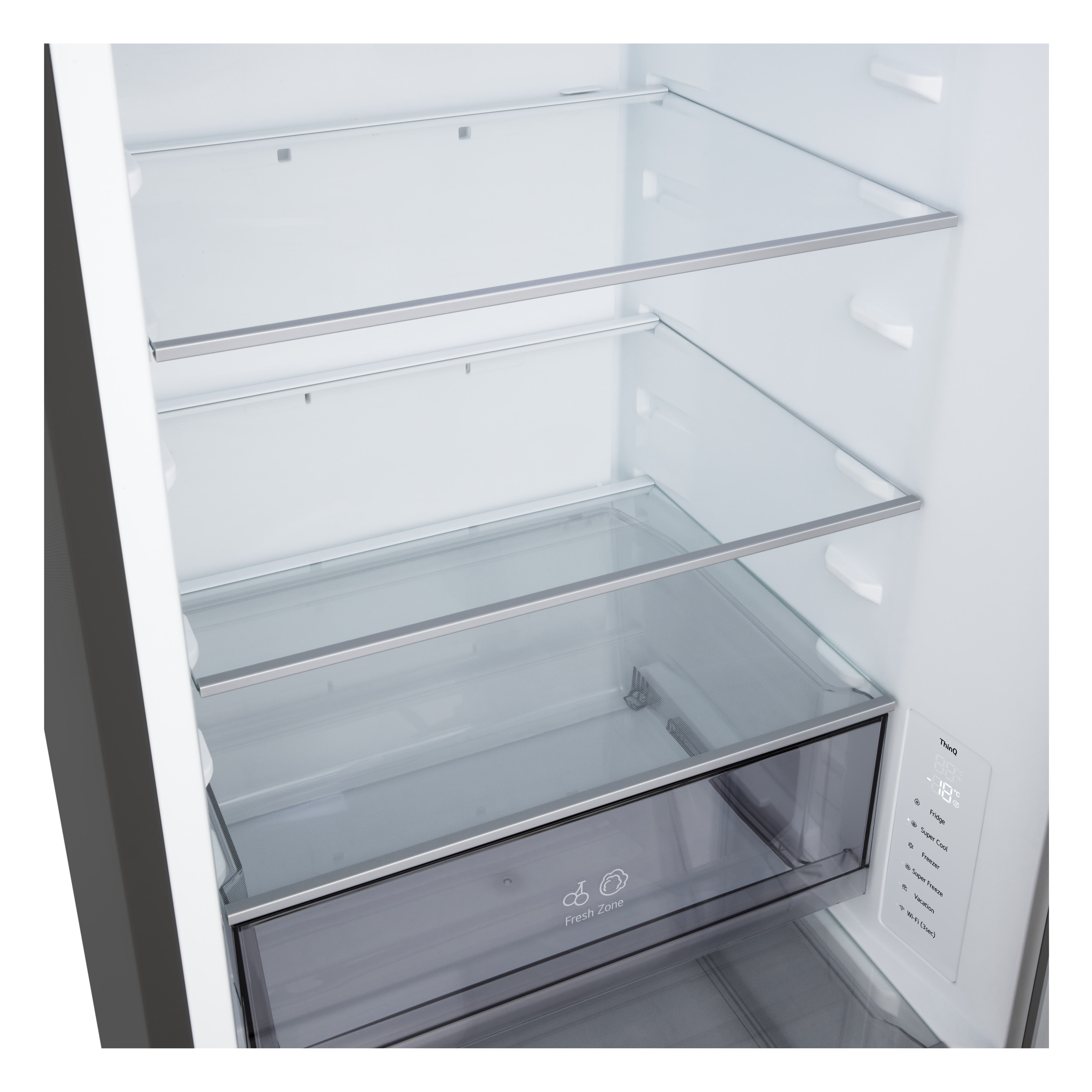 All'interno di un frigorifero, sono visibili ripiani vuoti e un cassetto con l'etichetta "Fresh Zone".
