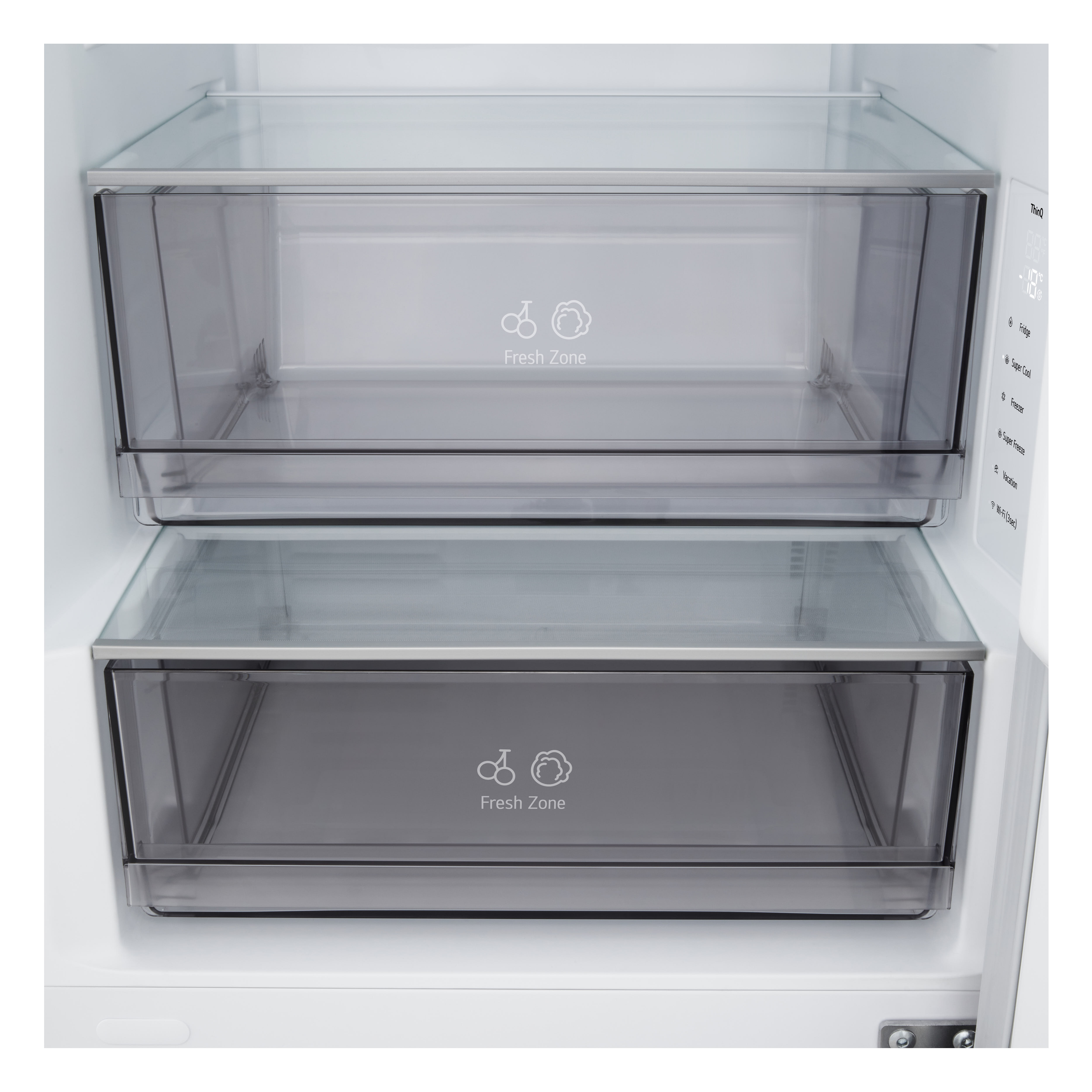All'interno di un frigorifero, sono visibili due cassetti trasparenti con l'etichetta 'Fresh Zone'. L'interno è bianco.