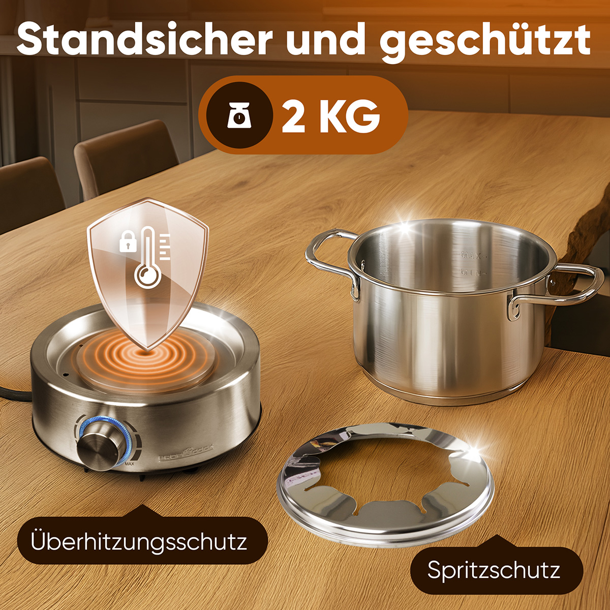 Eine Edelstahl-Kochplatte mit Topf, Schutzschild und Spritzschutz auf Holz. Text zeigt Schutz und 2 KG an.