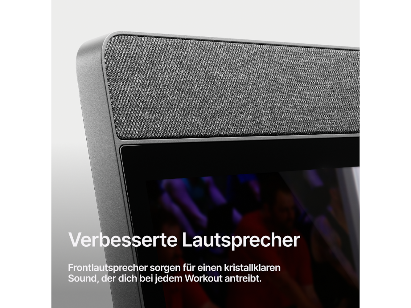 Nahaufnahme eines Lautsprechers mit grauem Stoff, Teil eines Geräts. Darunter steht 'Verbesserte Lautsprecher' und Details.