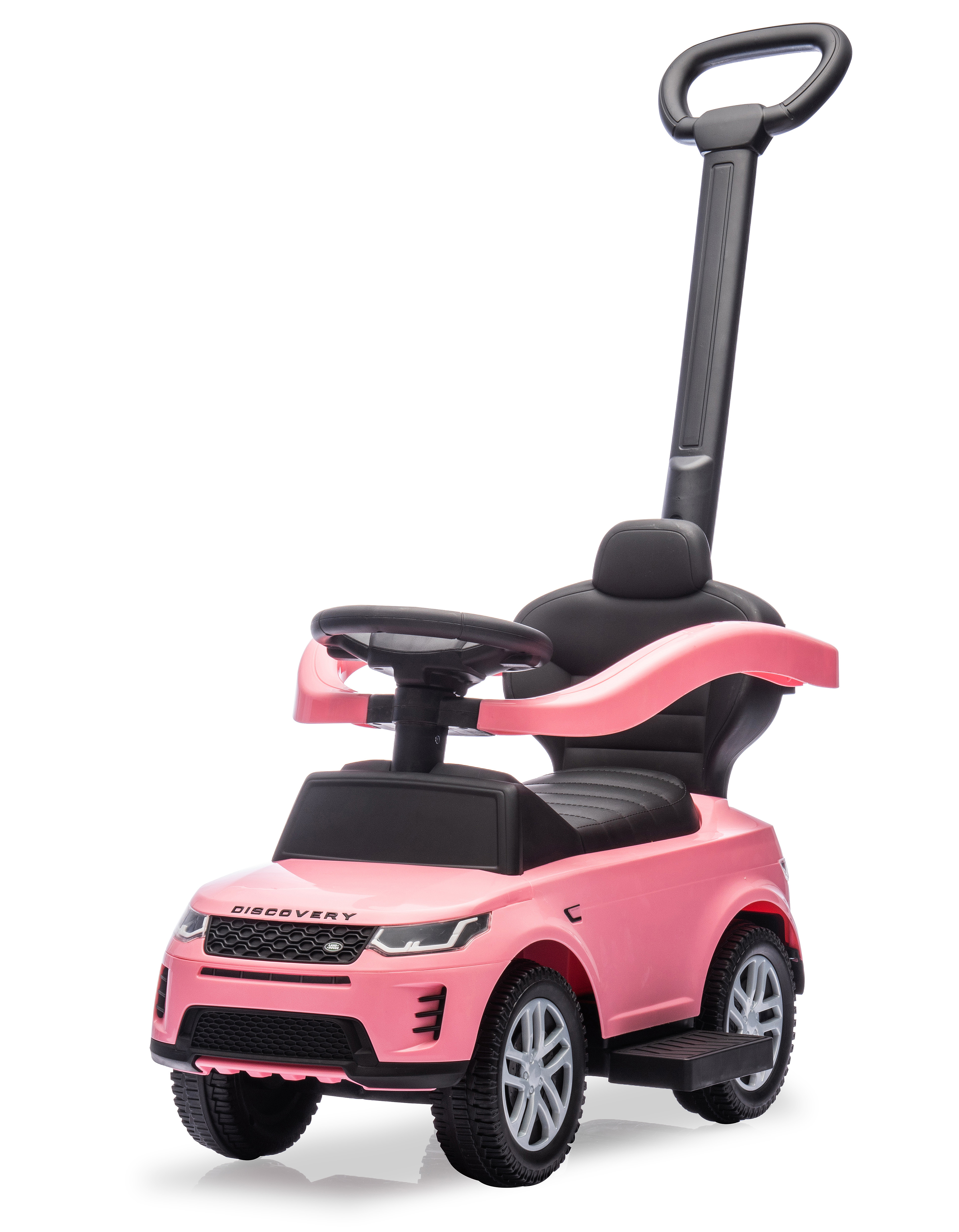 Un'auto giocattolo rosa con maniglia, volante e sedile neri. È un'auto a spinta con la scritta 'DISCOVERY'.