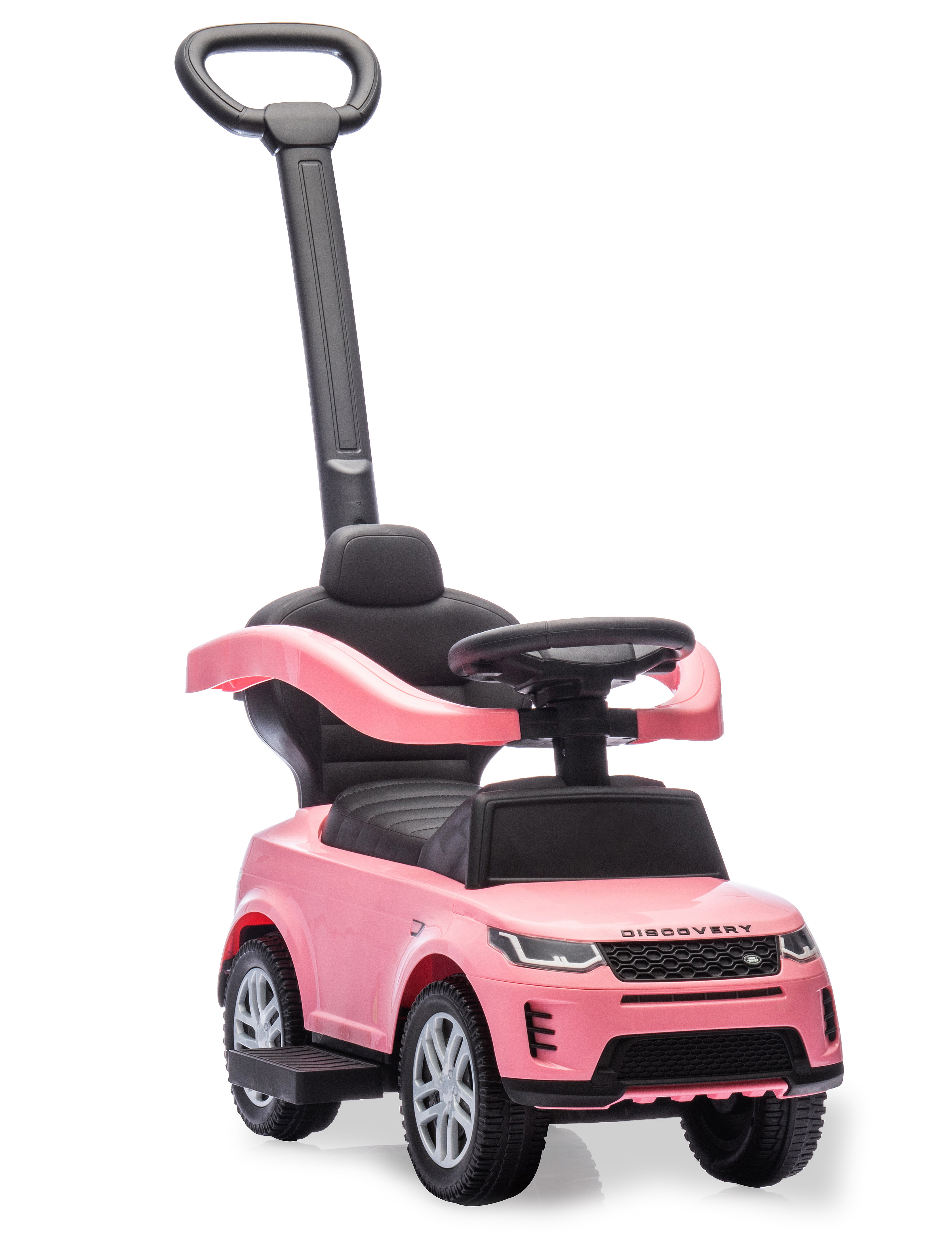 Un'auto giocattolo rosa con maniglia e sedile neri. Ha ruote e volante. Visibile la scritta 'DISCOVERY'.