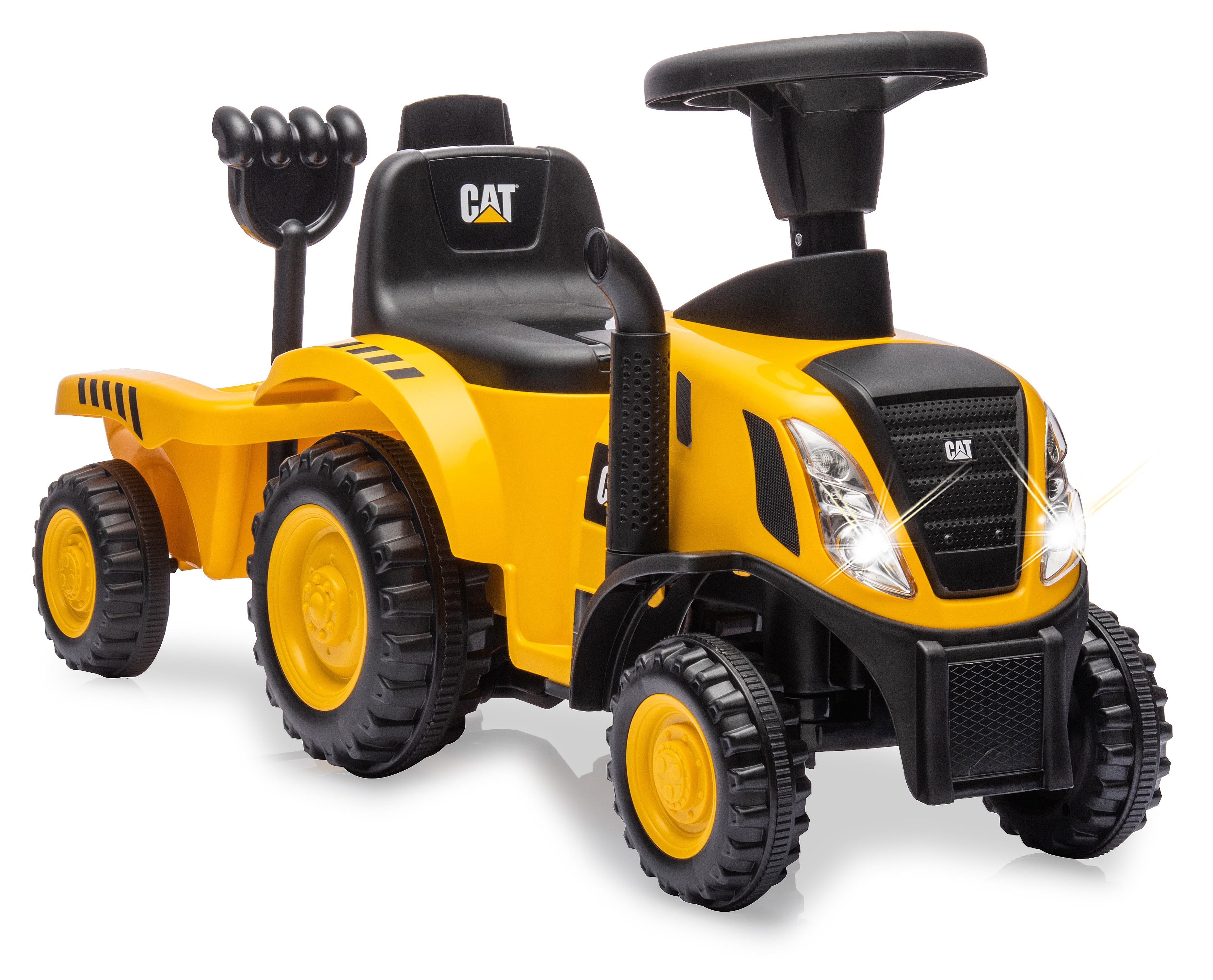 Ein gelber und schwarzer Spielzeugtraktor mit Anhänger. Er hat funktionierende Scheinwerfer und das CAT-Logo.