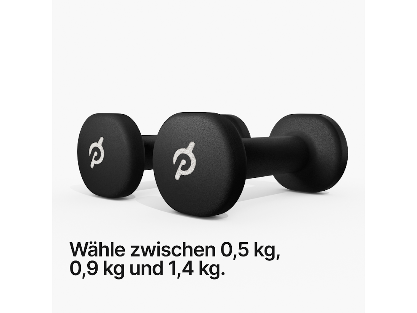 Zwei schwarze Kurzhanteln mit weißem Logo auf weißem Hintergrund. Text unten zeigt Gewichtsoptionen.