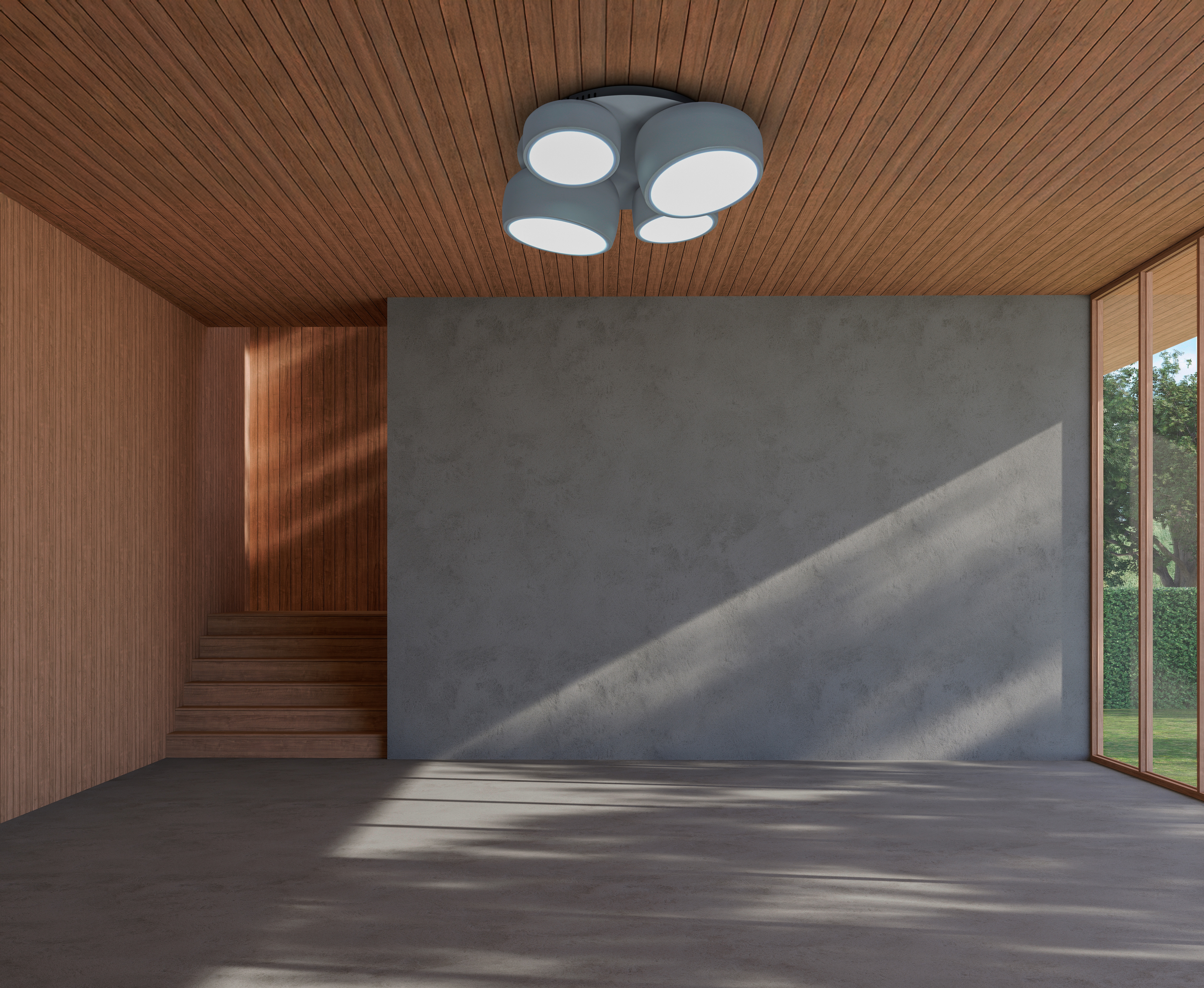 Ein Innenraum mit Holzverkleidung, Betonwand und einem großen Fenster mit Blick auf einen grünen Garten. Eine Deckenleuchte hängt an der Decke.