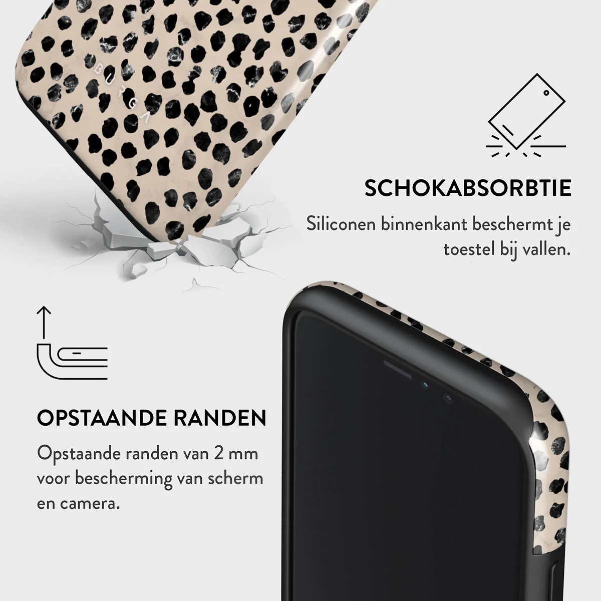 A phone case with a black and beige dalmatian pattern. It has raised edges and shock absorption features.