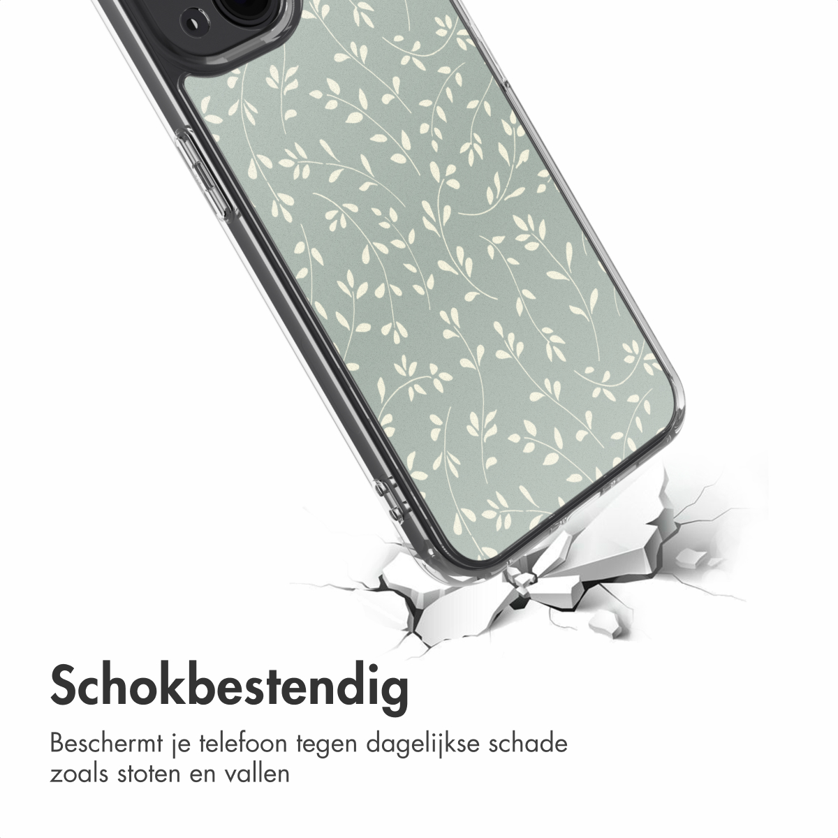 Une coque de téléphone avec un motif floral brise une surface. La coque est vert clair avec des feuilles blanches. La surface est fissurée.