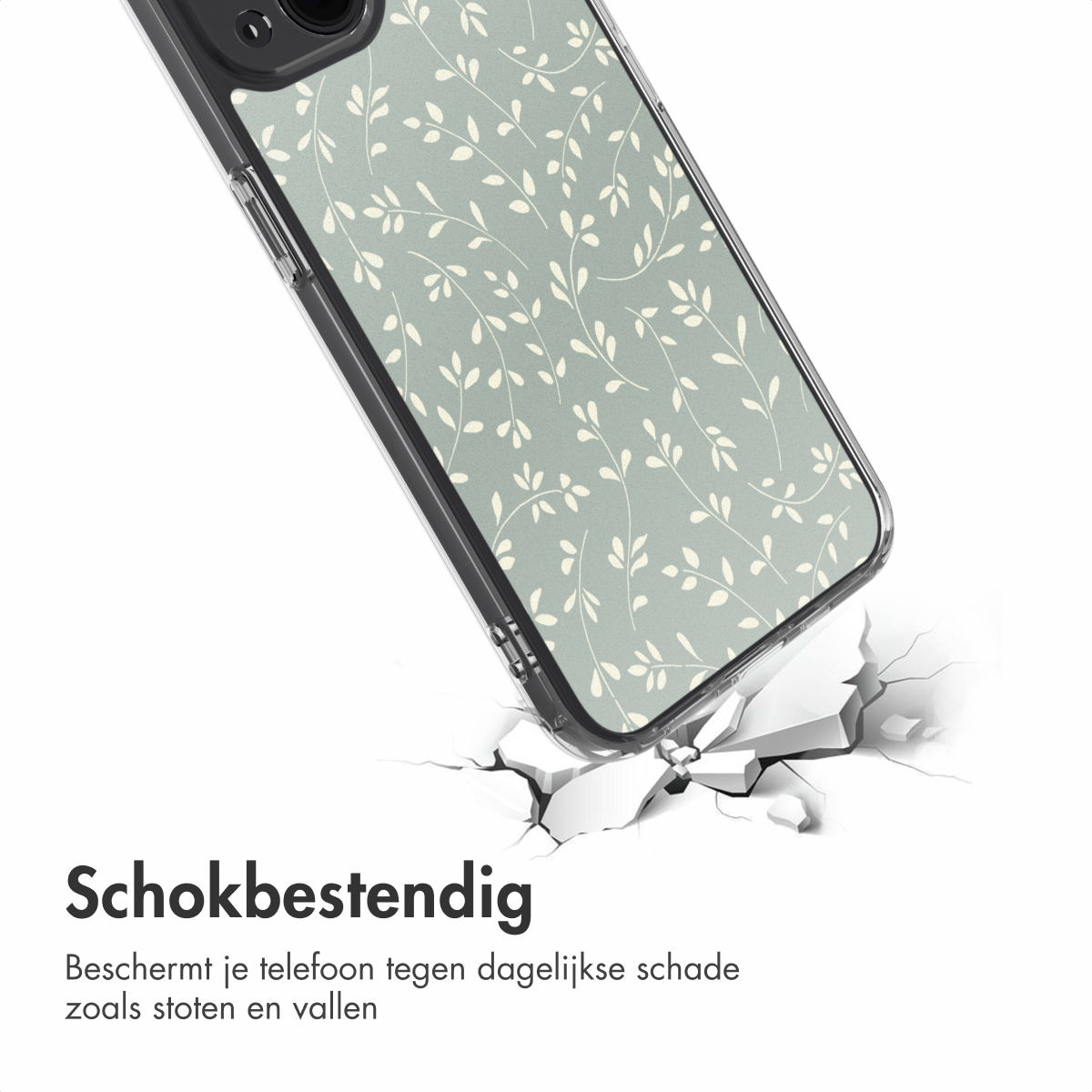 Una custodia per telefono con un motivo floreale bianco poggia su una superficie crepata. La custodia è trasparente con bordi neri, con sfondo grigio-verde.