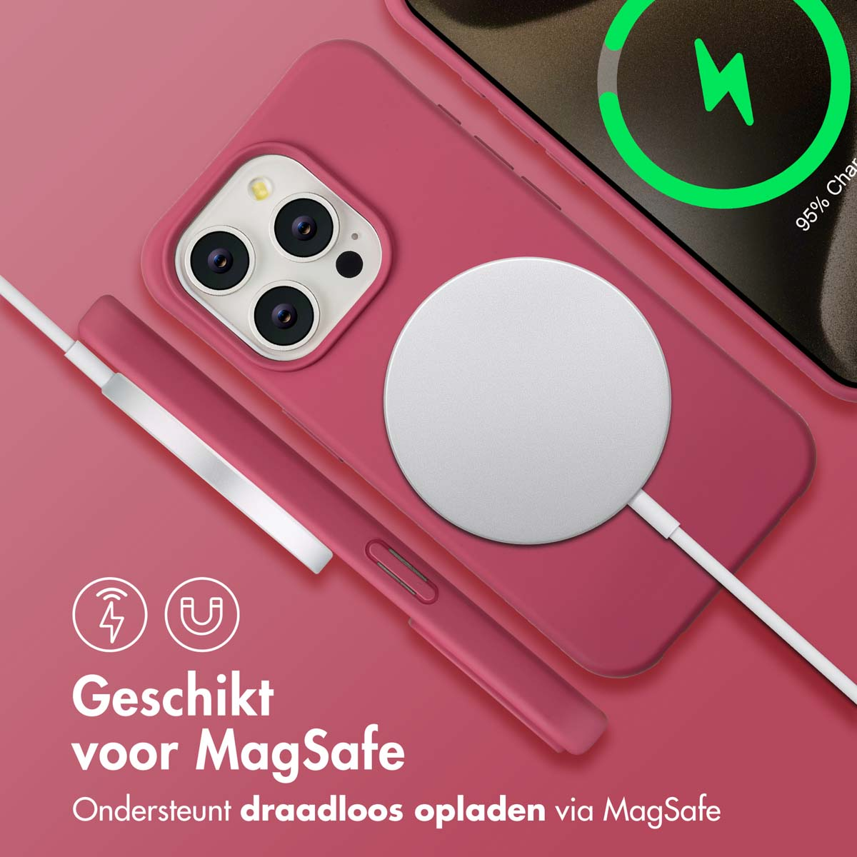 Een roze telefoonhoesje met een witte MagSafe-lader bevestigd aan een telefoon. De telefoon toont een oplaadpictogram.