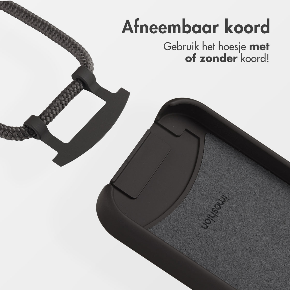 Close-up van een zwarte telefoonhoes met afneembare koord, de hoes is gedeeltelijk open. Tekst in het Nederlands.