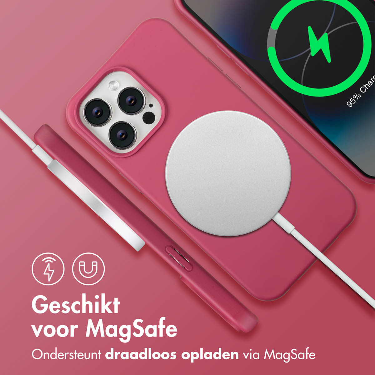 iPhone rose avec chargeur MagSafe. Le téléphone affiche le chargement. Câble de charge blanc. Texte : Geschikt voor MagSafe. Prise en charge de la charge sans fil.