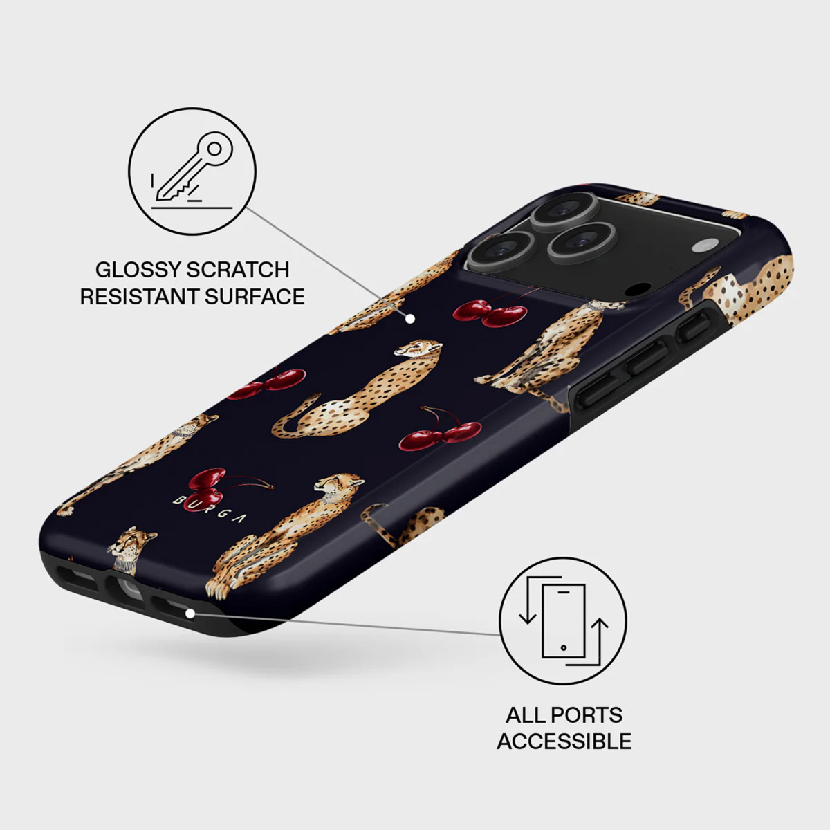 Une coque de téléphone avec un motif de guépard et de cerises sur fond sombre. Texte : Surface brillante résistante aux rayures. Tous les ports accessibles.