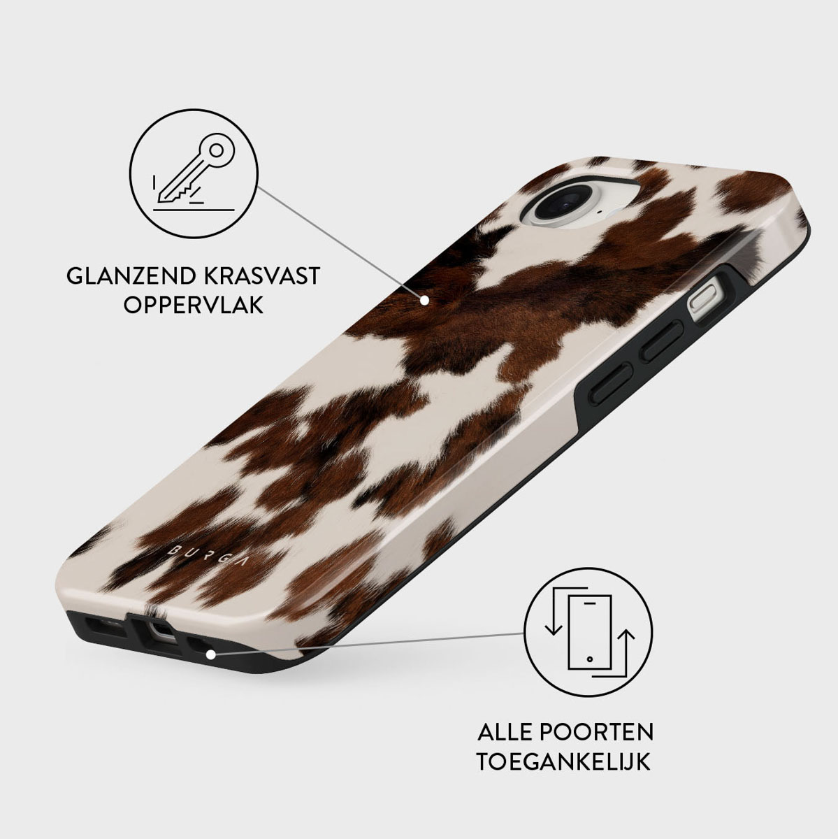 Een telefoonhoesje met een koeienhuidpatroon. Het ontwerp heeft bruine en witte vlekken. De hoes is schuin en toont het glanzende oppervlak.