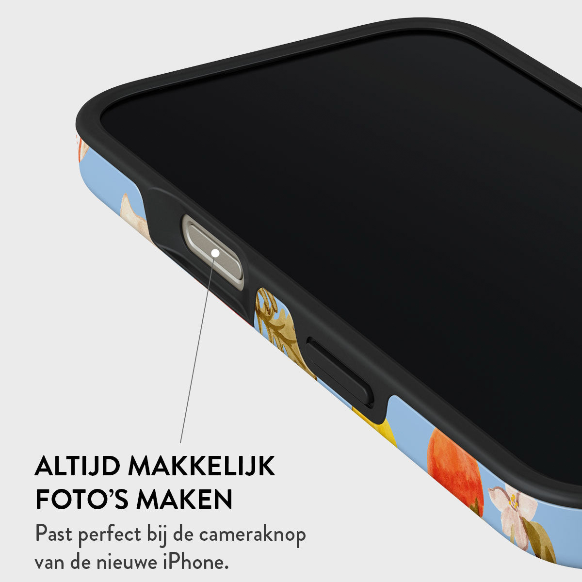 Gros plan sur une coque de téléphone avec un motif floral. La coque est noire et bleue. Le texte dit: 'Toujours facile de prendre des photos'.