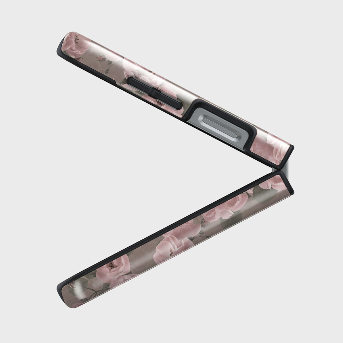 Un téléphone pliable avec un motif floral. Le téléphone est ouvert en angle, révélant un motif de roses roses sur un fond tamisé.