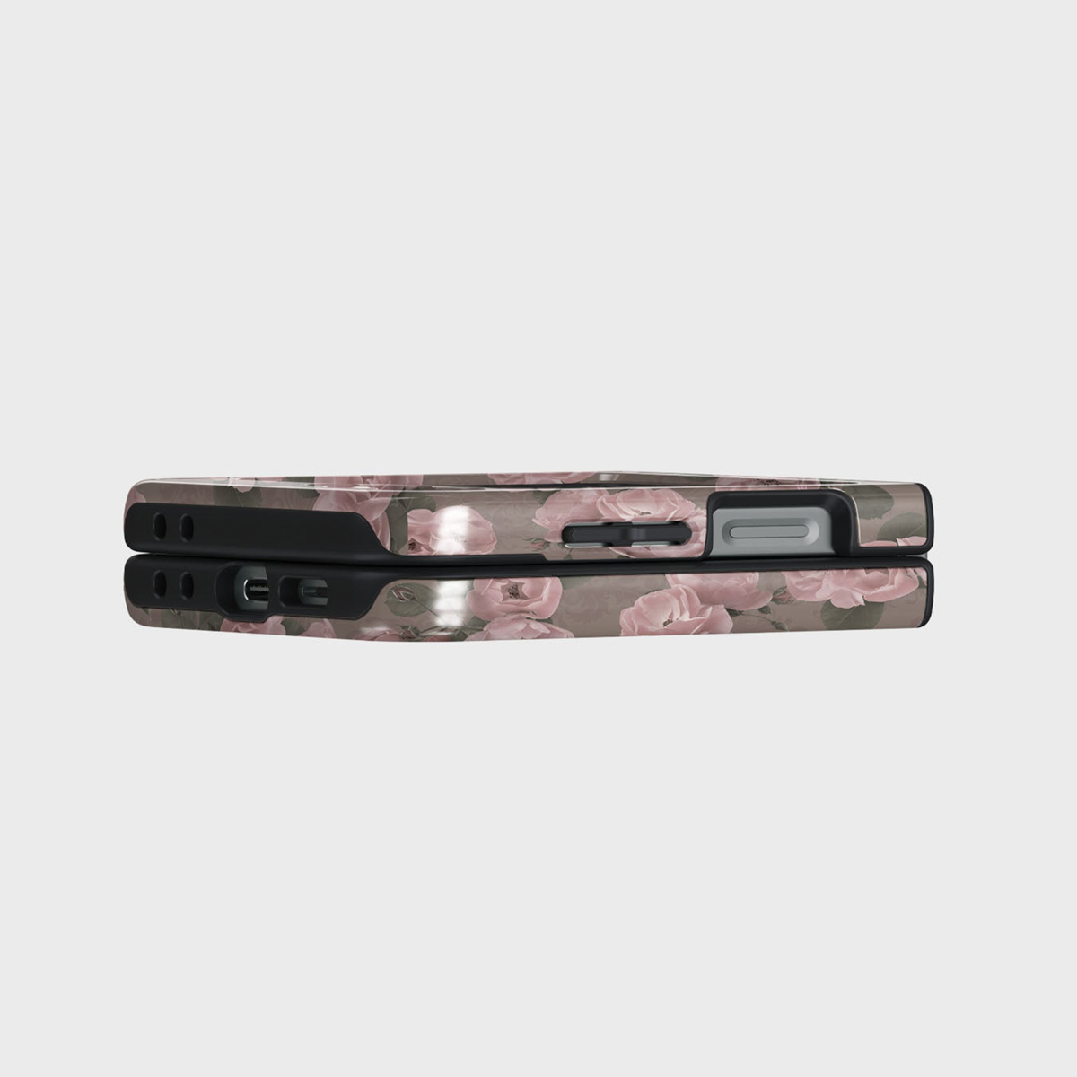 Deux étuis de téléphone sont empilés. L'étui supérieur est orienté vers le bas avec un motif floral de roses roses sur un fond beige.