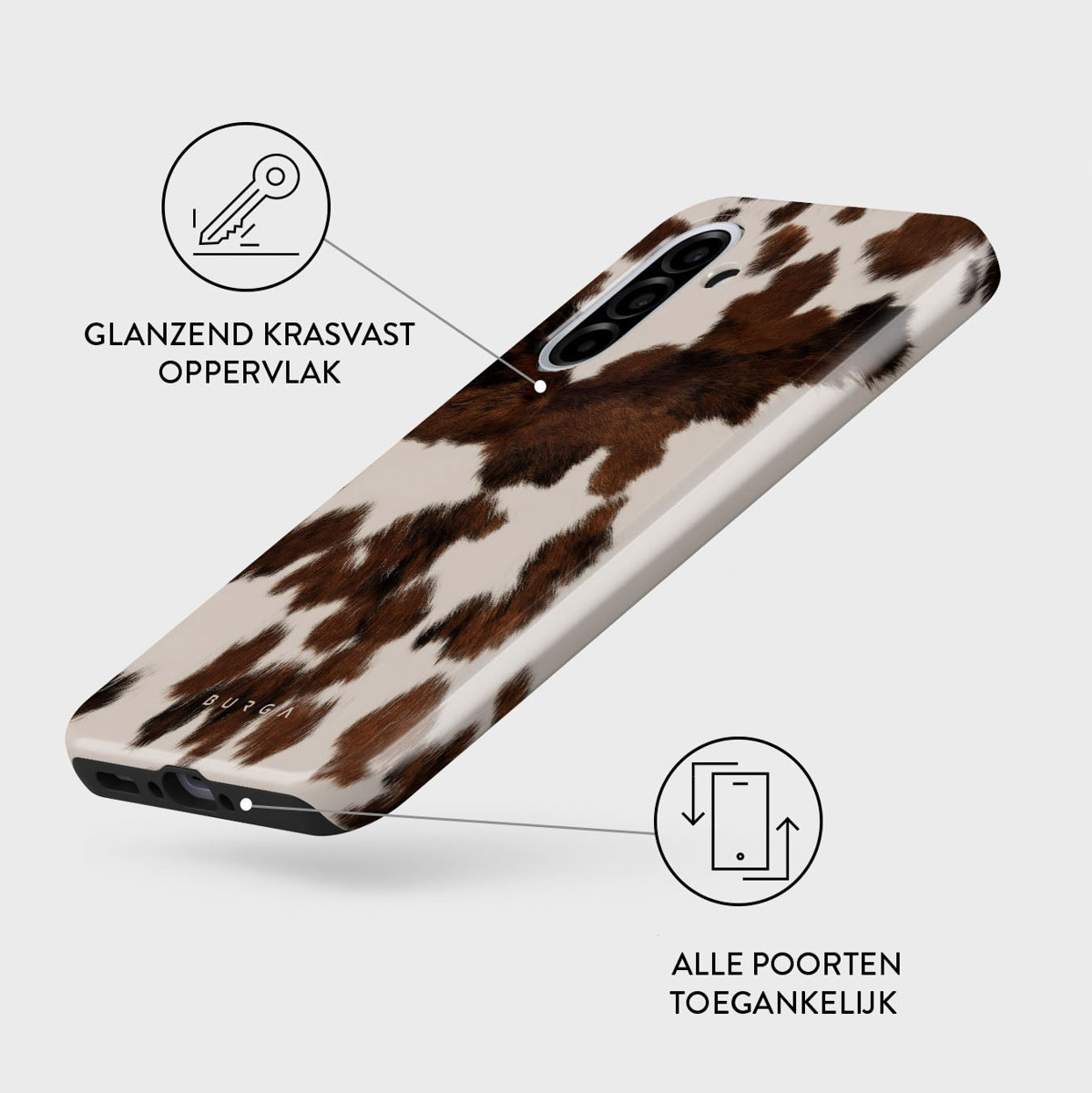 Een telefoonhoesje met een koeienhuidpatroon. Het heeft bruine en witte vlekken. De hoes is glanzend.