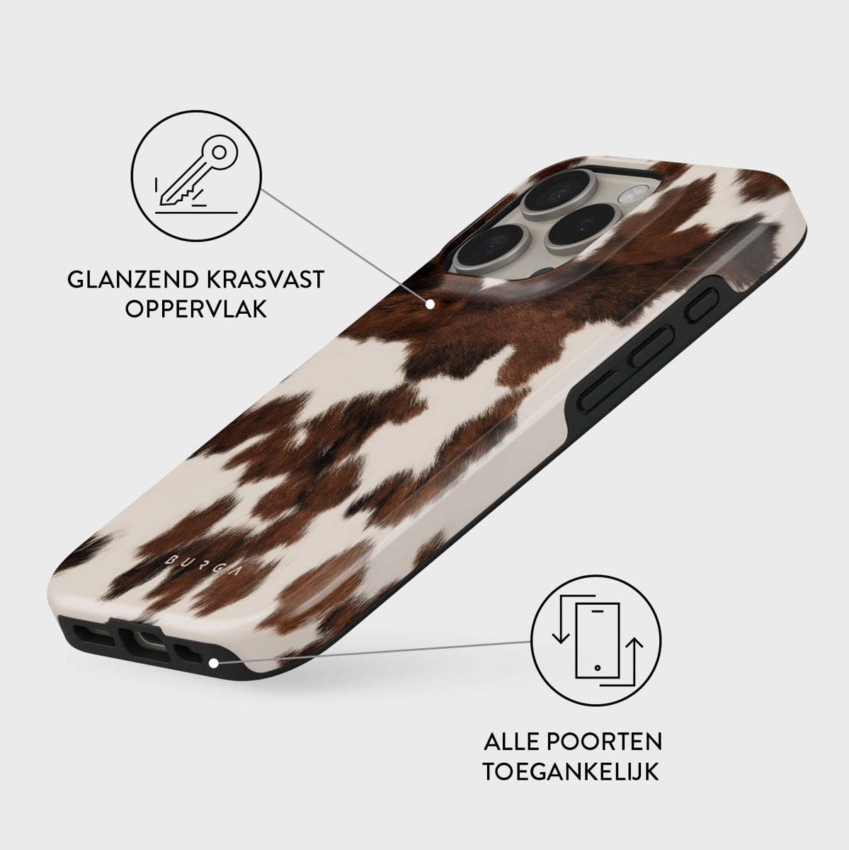 Een telefoonhoesje met koeienhuidpatroon. Bruin en wit ontwerp. De hoes zit op een witte achtergrond. Tekst zegt glanzend krasvast oppervlak.
