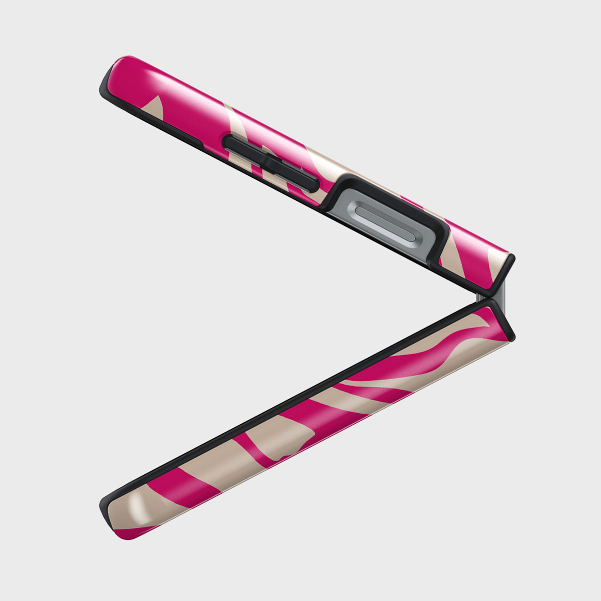 Un téléphone pliable à motifs rose et beige, ouvert en angle. Le téléphone est sur fond blanc.