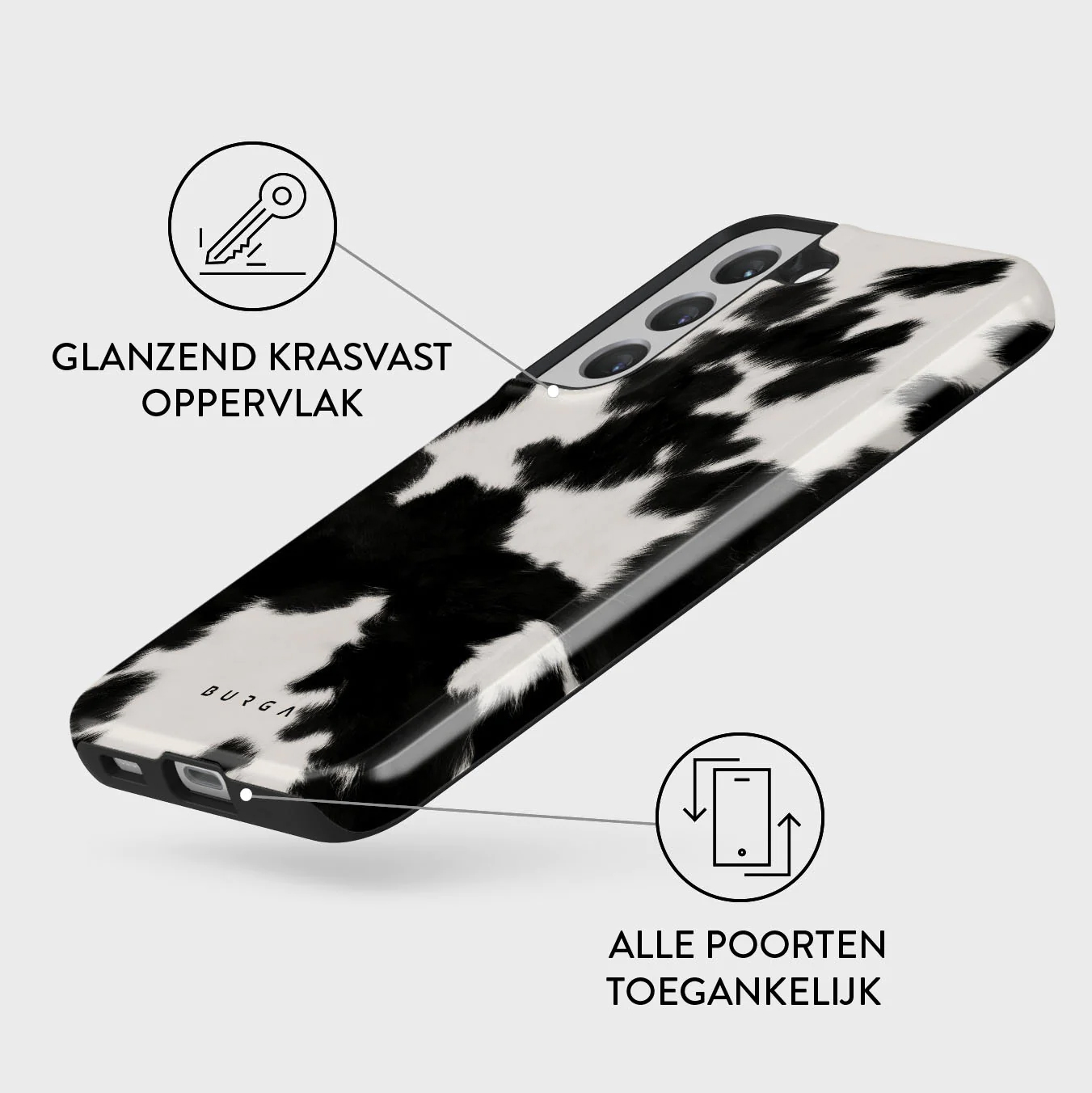 Een telefoonhoesje met een zwart-wit koeienpatroon. Het heeft een glanzend, krasbestendig oppervlak. Alle poorten zijn toegankelijk.