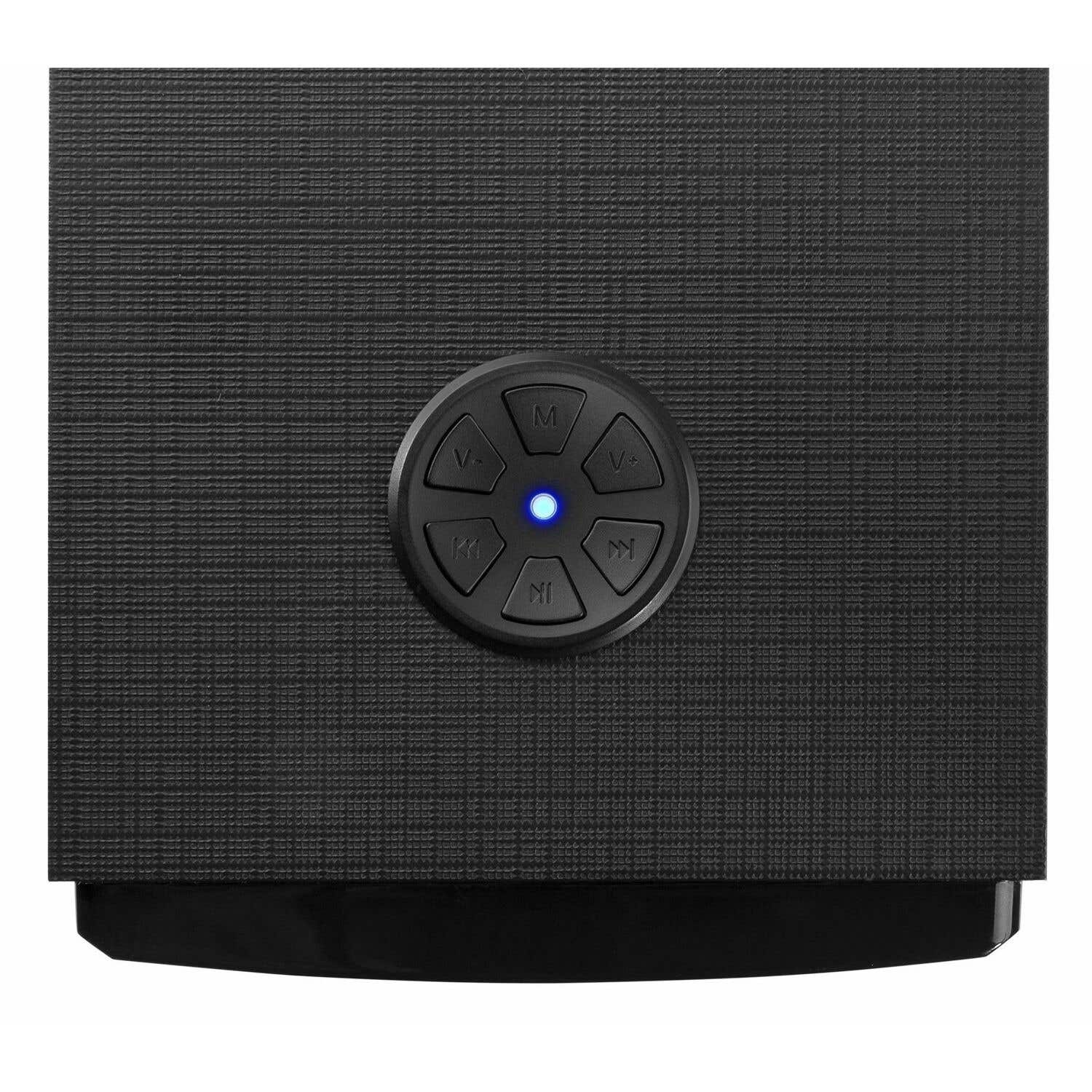 Un altavoz negro con un panel de control redondo. El panel tiene botones para volumen, reproducción y selección de modo. Hay una luz azul encendida.
