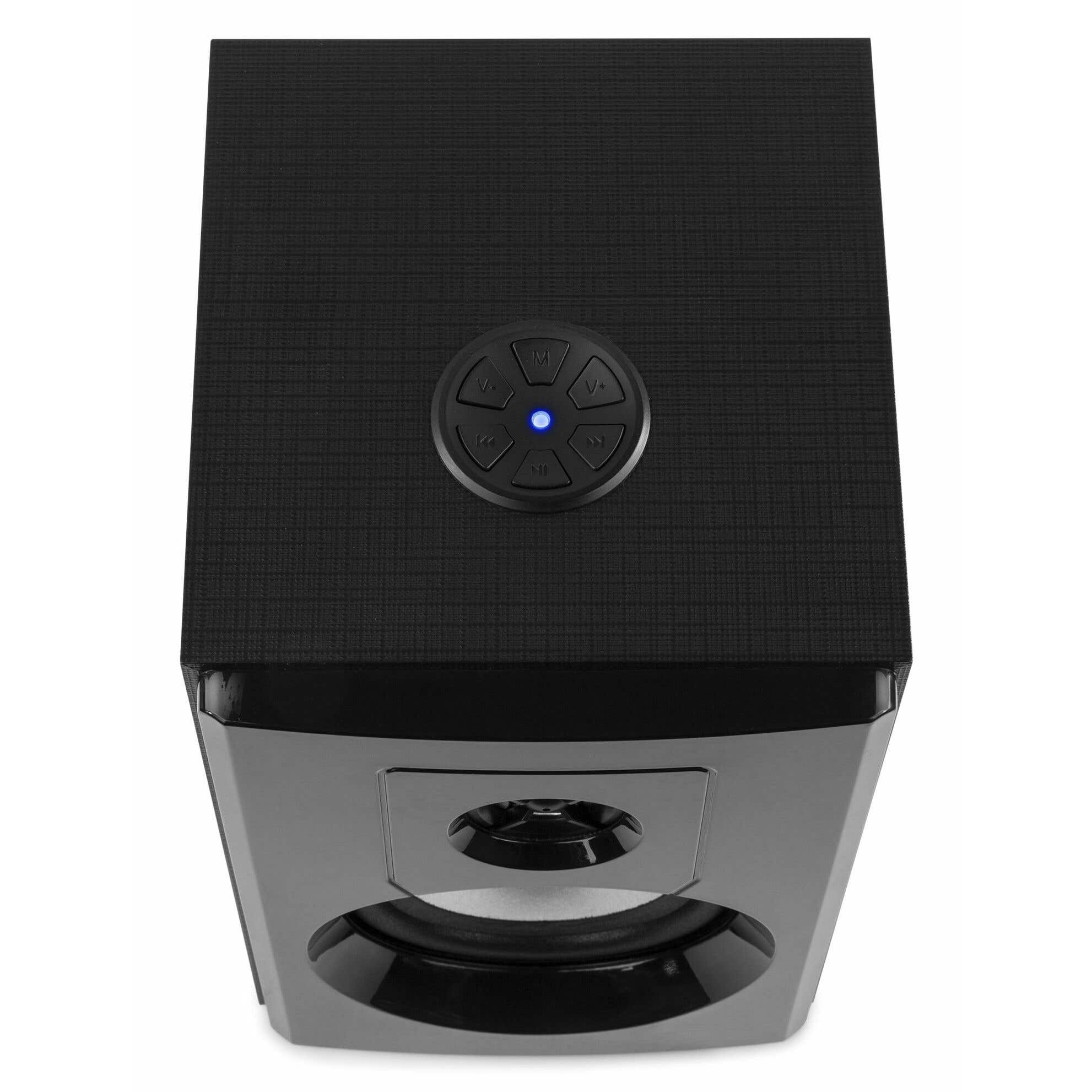 Altavoz negro con panel de control arriba, parte inferior brillante y rejilla. LED azul indica encendido.