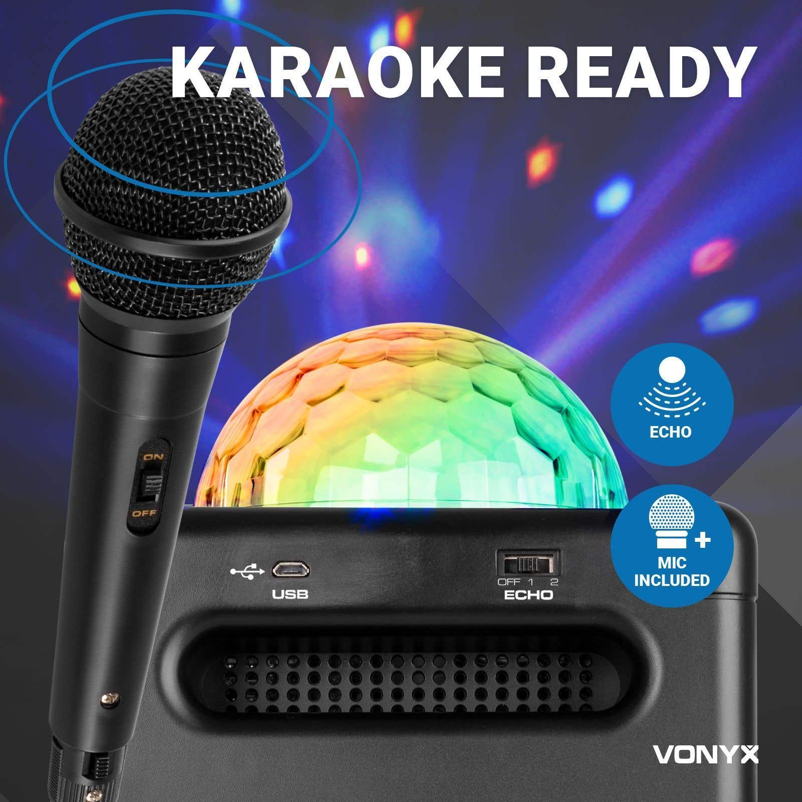 Una macchina per karaoke nera con microfono, palla da discoteca e testo 'Karaoke Ready'. Include eco e microfono.