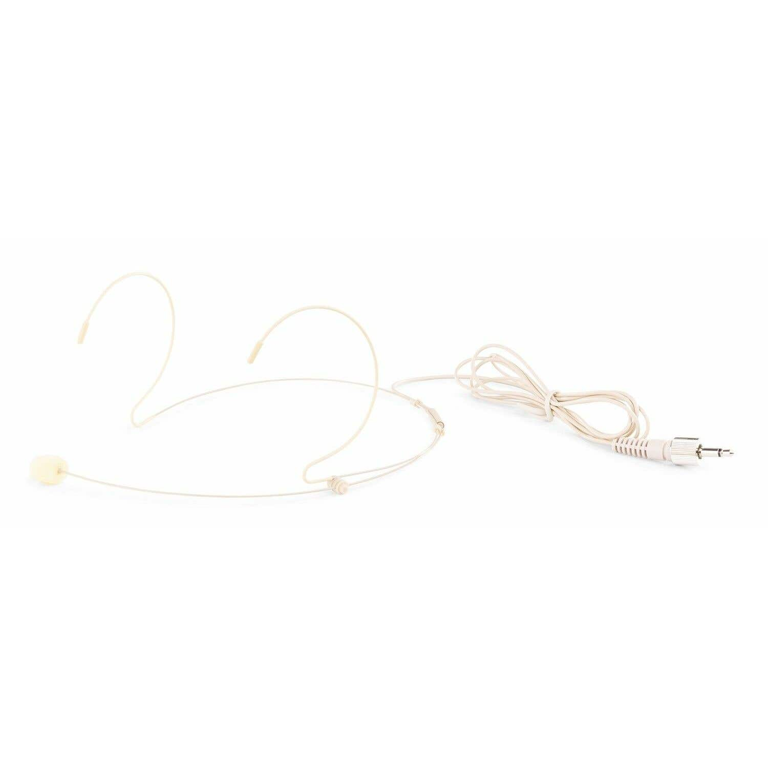 A beige headset microphone with a cable and plug lies on a white surface. The mic is on the left.