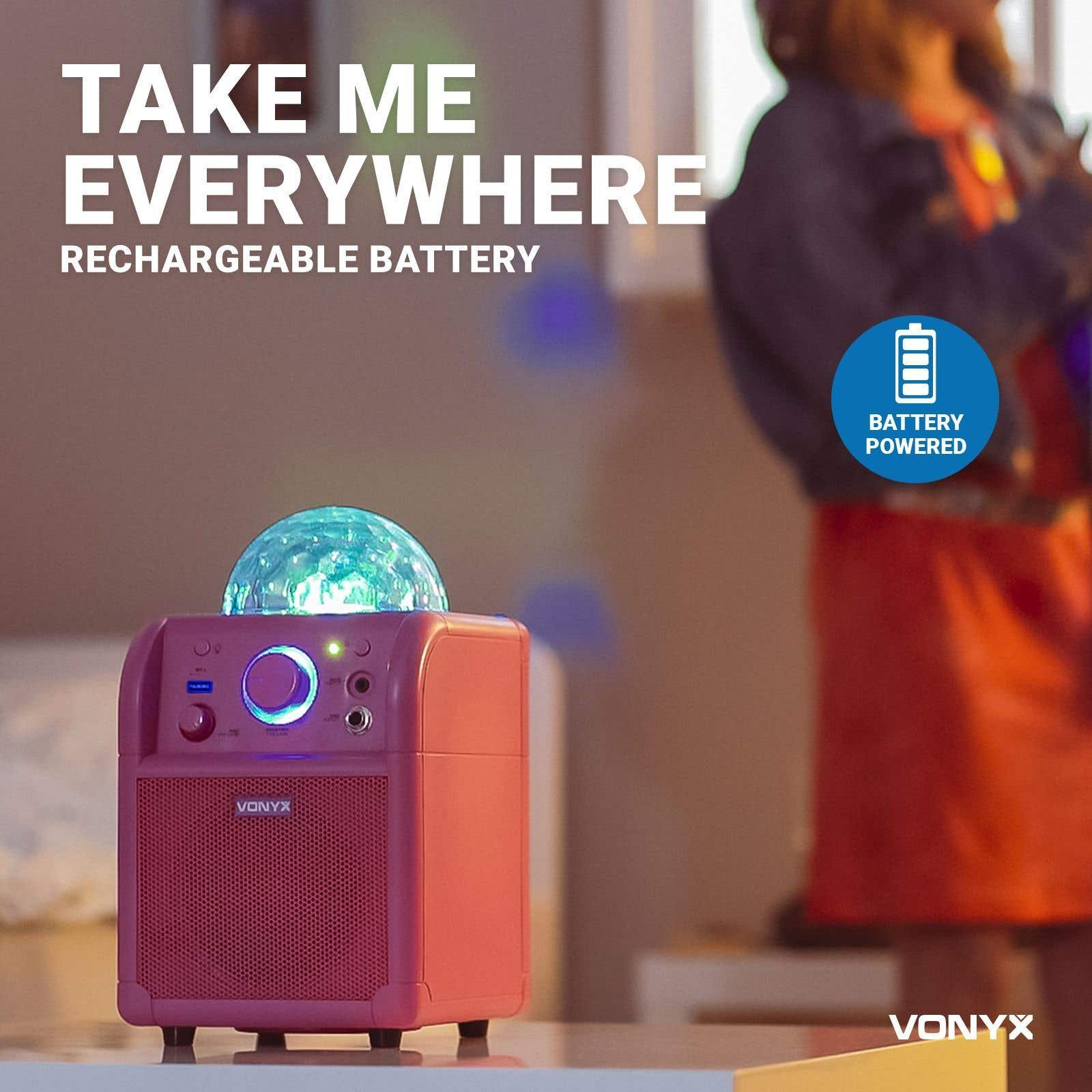 Un altavoz rojo con una bola de discoteca encima. El texto dice 'Take me everywhere' y 'Rechargeable battery'.