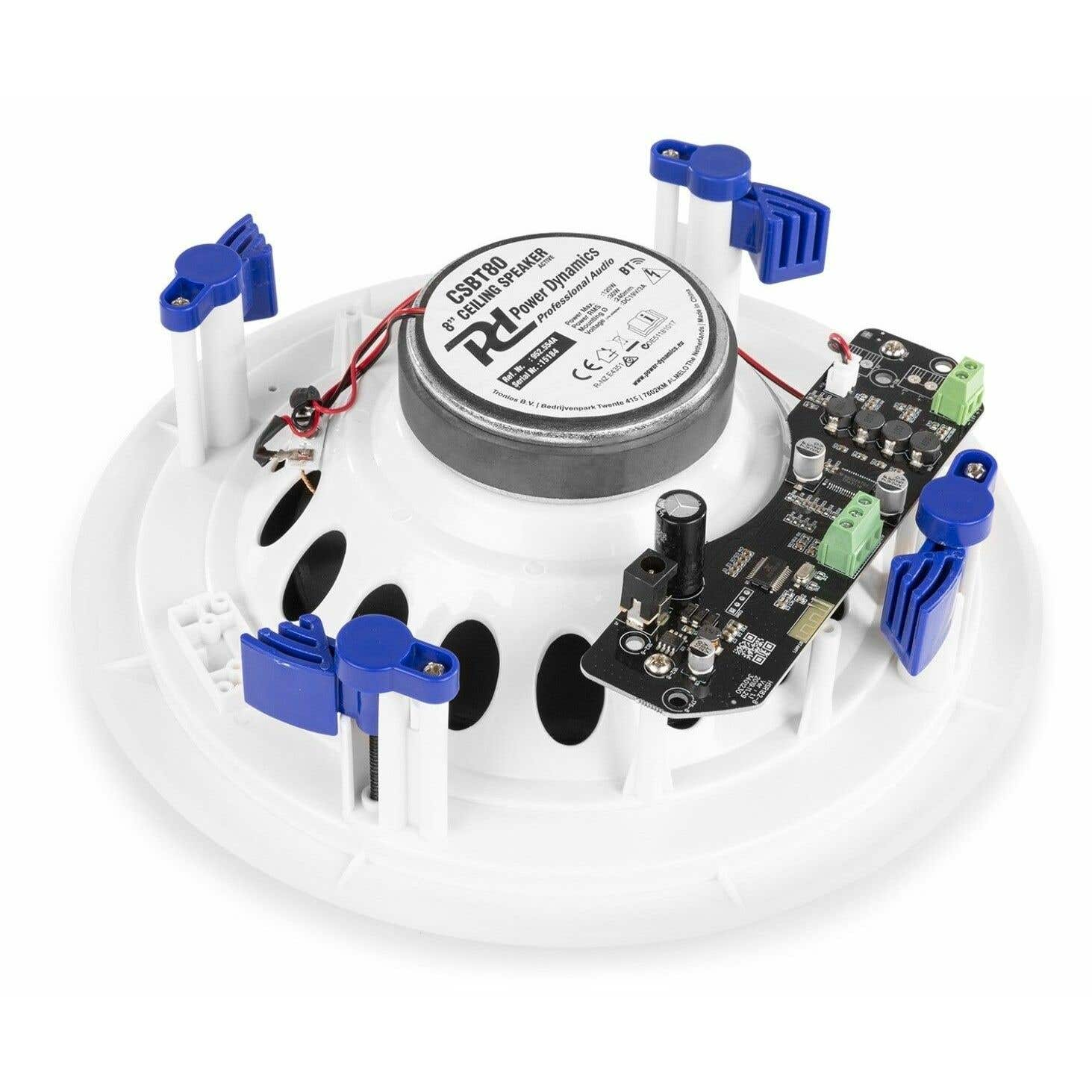 Altavoz de techo blanco con clips azules, placa de circuito negra y la marca Power Dynamics visible.