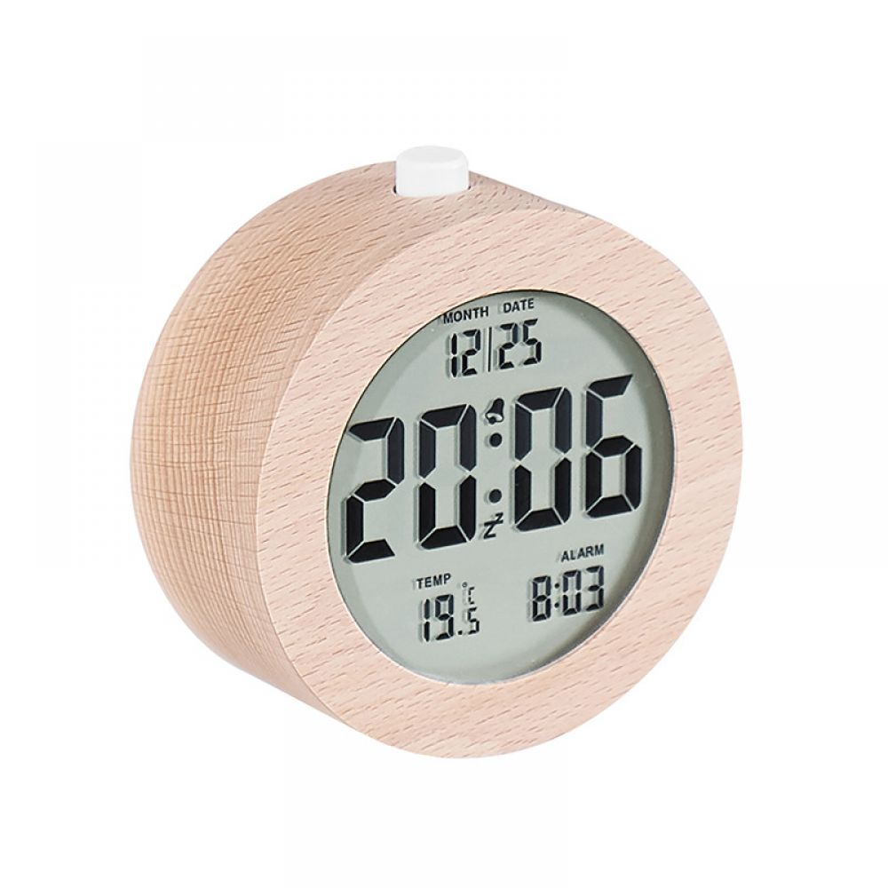 Un orologio digitale in legno mostra 20:06, la data 12/25, la sveglia 8:03 e la temperatura di 19,5°C. C'è un pulsante bianco in alto.