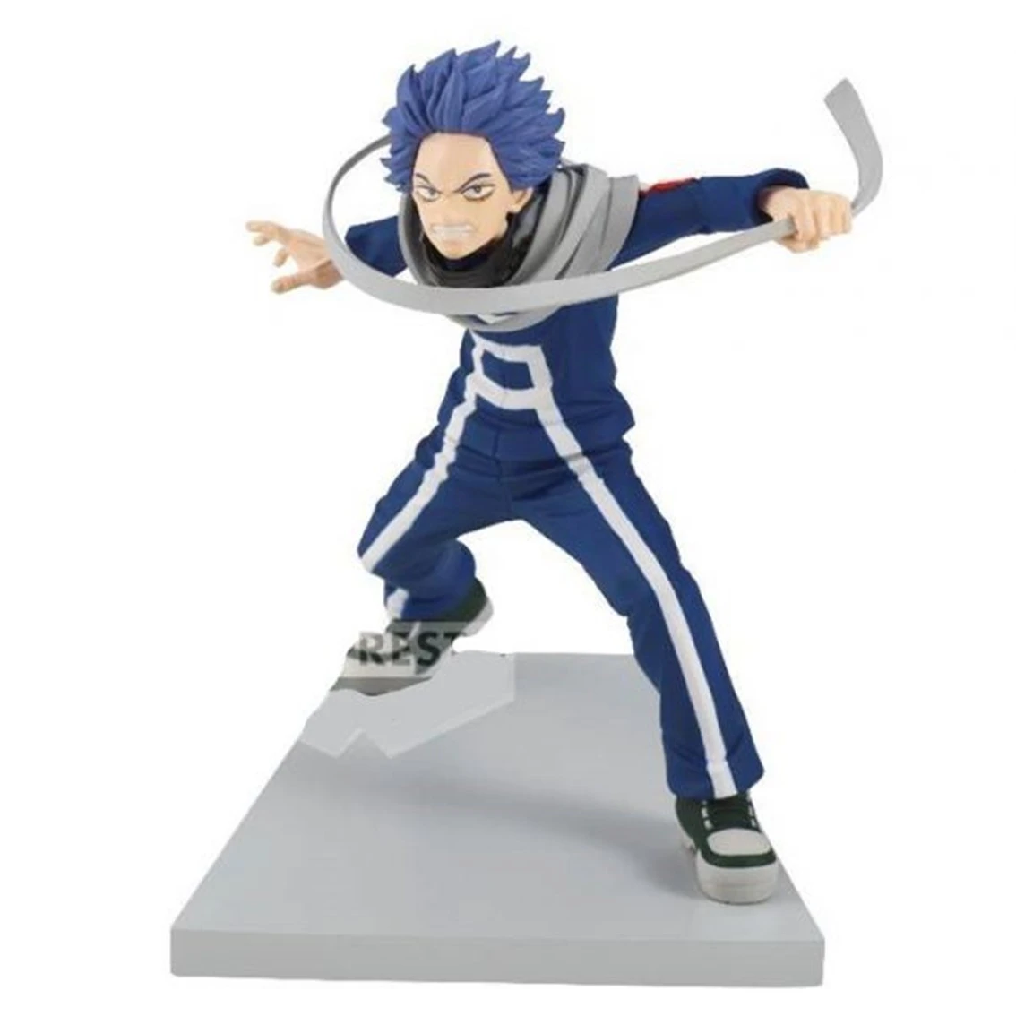 Figura de un personaje masculino con traje azul con rayas blancas, pelo azul y bufanda gris, de pie sobre una base gris.