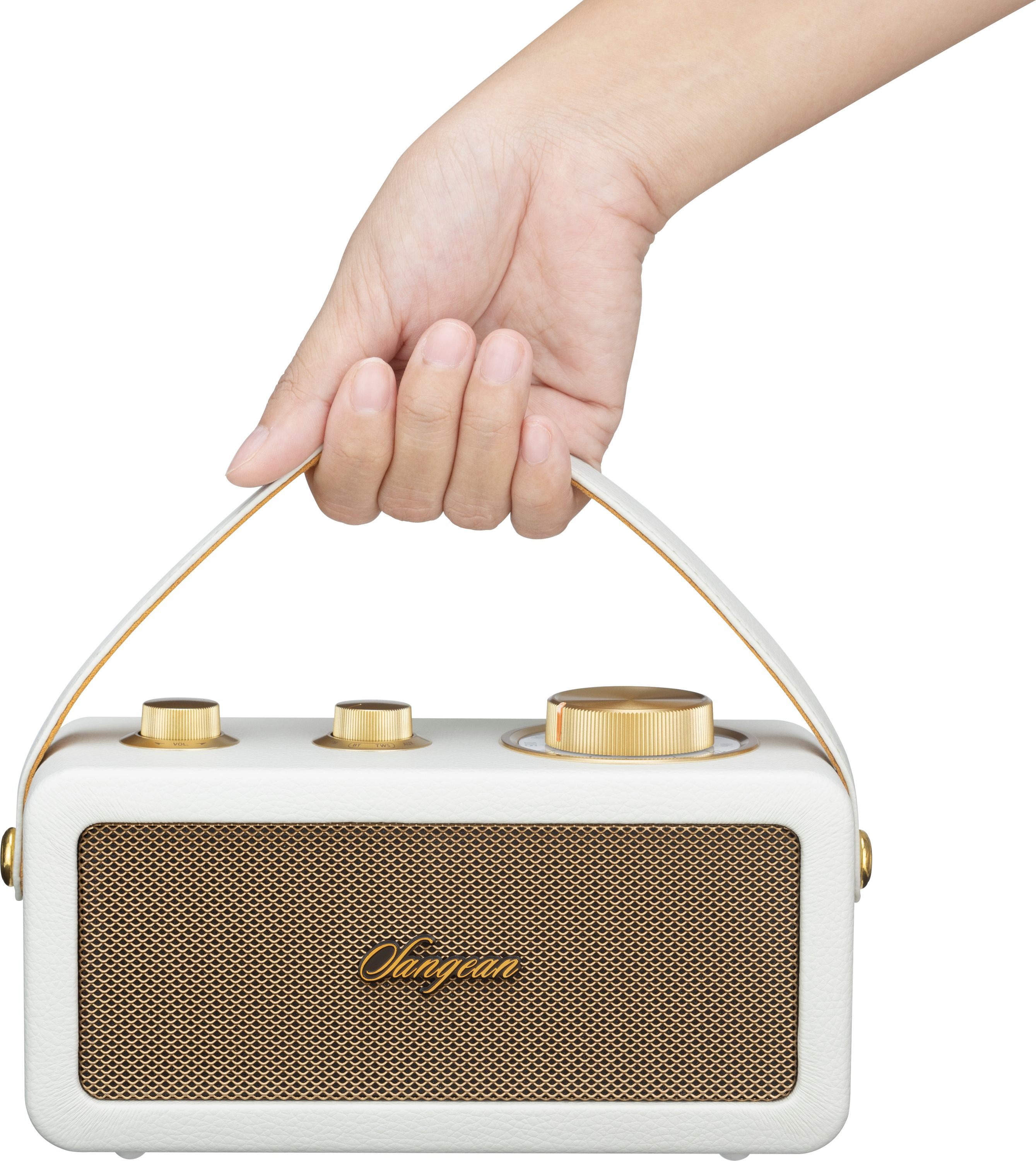 Mano sosteniendo un altavoz blanco y dorado. El altavoz tiene una rejilla frontal dorada, cuero blanco y perillas doradas.